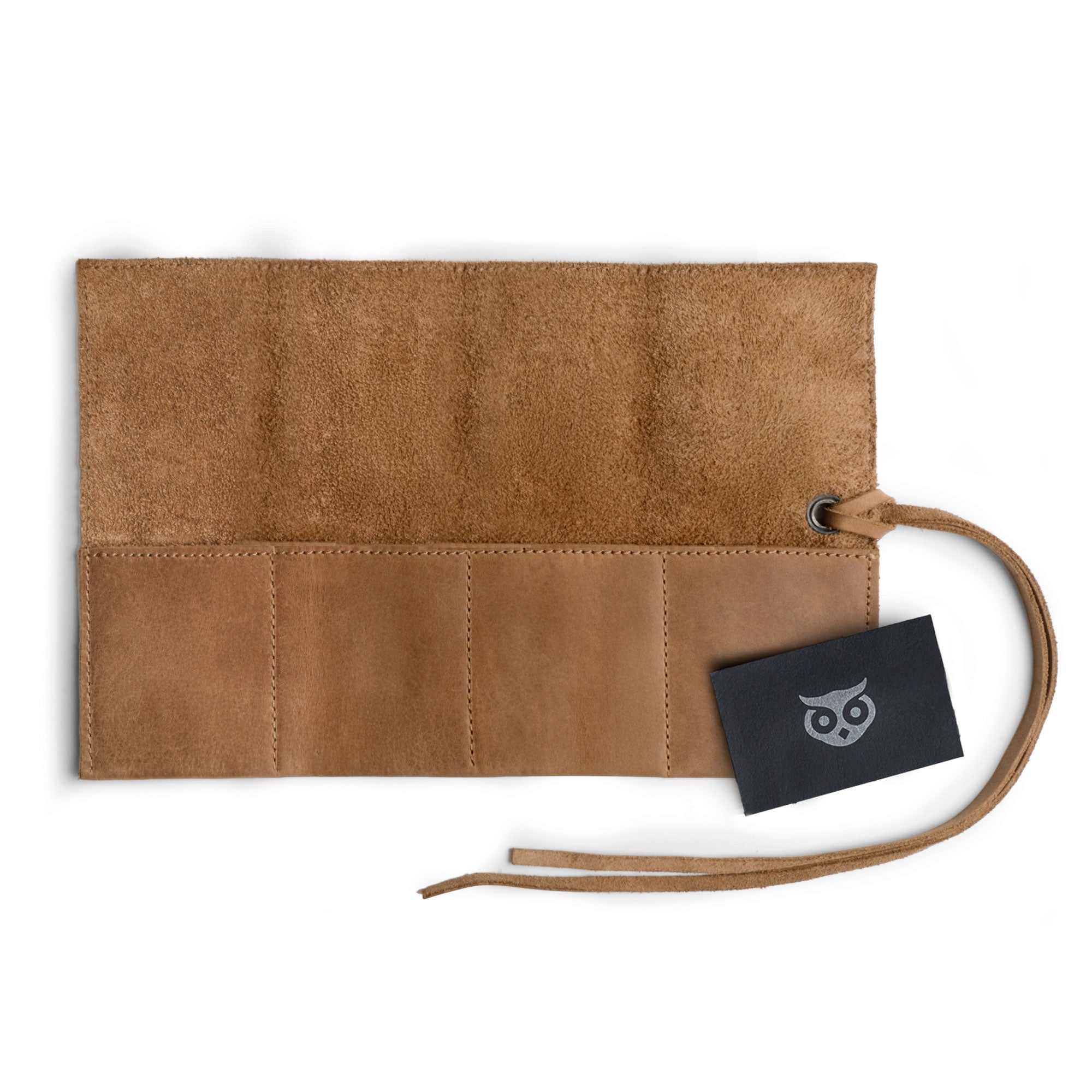 Unique brown leather Watch Roll by Hide & Drink, holds up to 4 watches. This easy carry Watch Roll Organizer is crafted with full grain leather, showcasing artisan quality from small batch production, hand cut, hand sewn, and fire branded made in La Antigua Guatemala & Oaxaca Mexico.