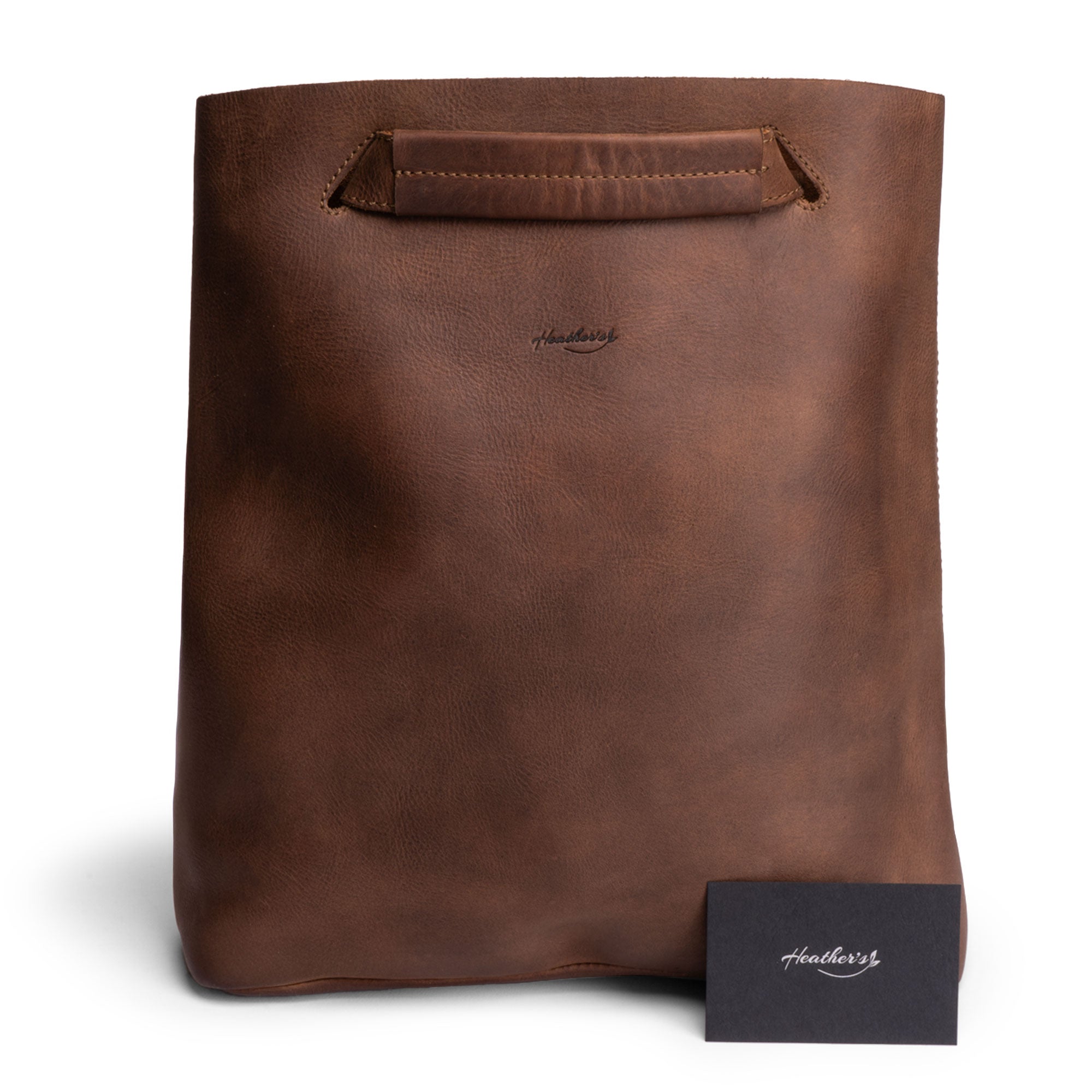 Front view of Heather's Convertible Backpack to Shoulder Bag, emphasizing its soft Full Grain Leather texture and elegant design. This stylish, spacious crossbody for women represents unique artisan craftsmanship from La Antigua Guatemala & Oaxaca Mexico, ideal for any occasion.