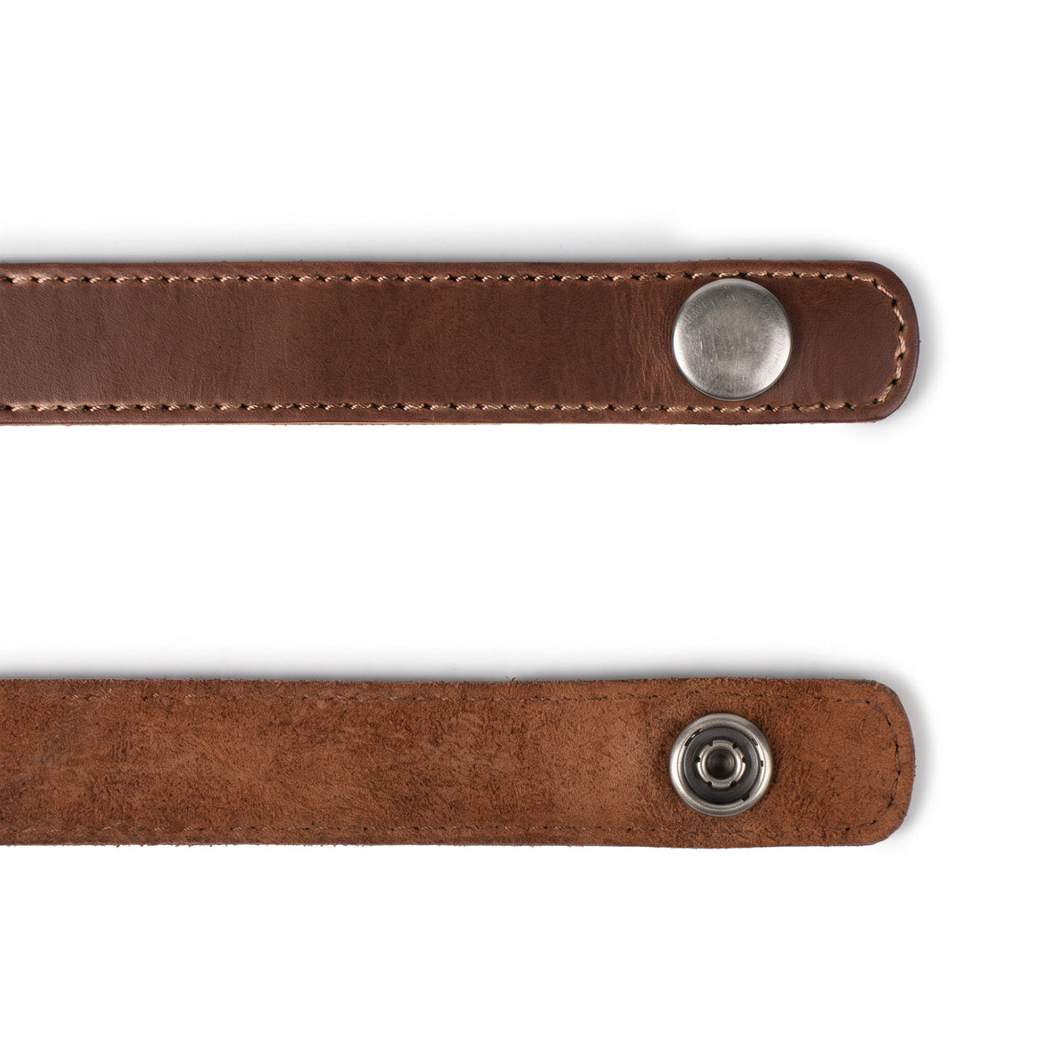 A close-up of the Hide & Drink Chemex Strap Replacement, highlighting its rich Full Grain Leather texture. This strap replaces old ties, adding style to your pour-over routine. Pour Over Strap (2 Pack) Compatible with Chemex 6-Cup Glass, featuring artisan craftsmanship from small batch production, hand cut and hand sewn, fire branded in La Antigua Guatemala & Oaxaca Mexico.