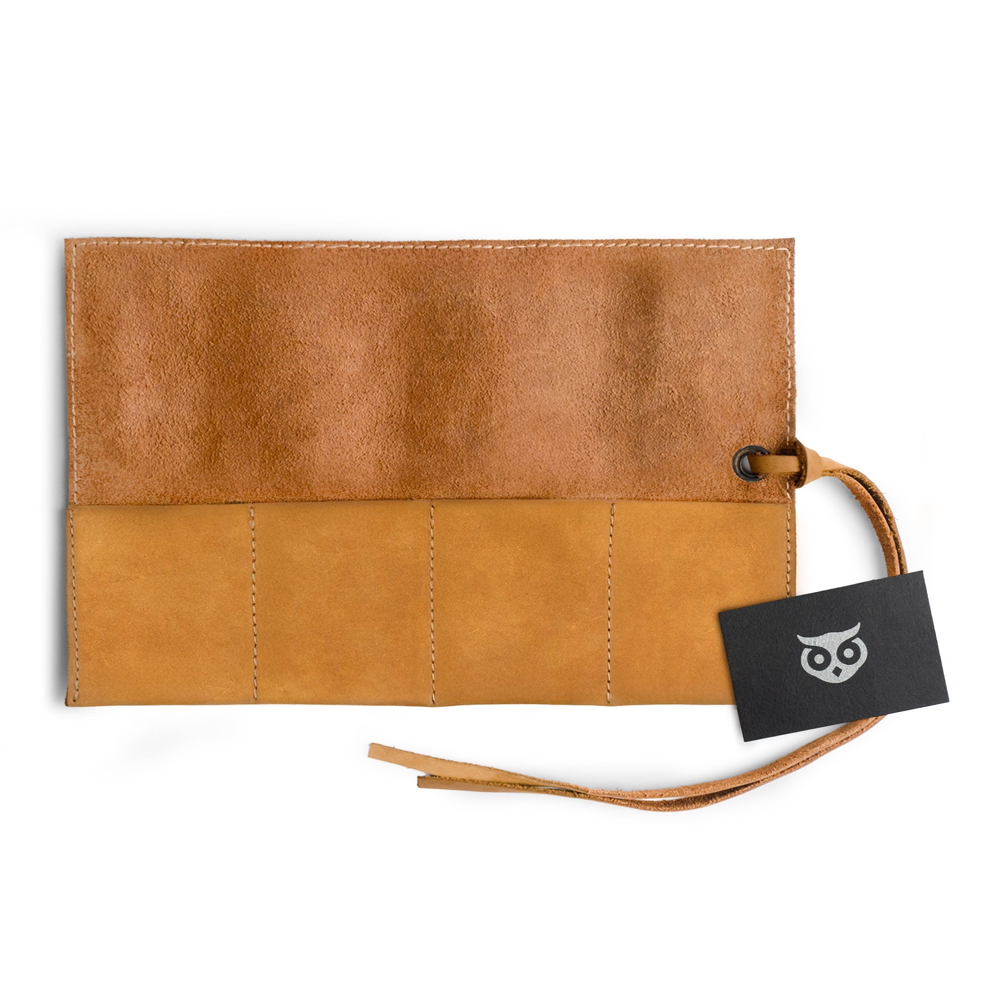 Distinctive Watch Roll from Hide & Drink, designed for 4 watches. This easy carry Watch Roll Organizer showcases full grain leather quality, reflecting the details of small batch production, hand cut, hand sewn craftsmanship, fire branded artisan quality made in La Antigua Guatemala & Oaxaca Mexico.