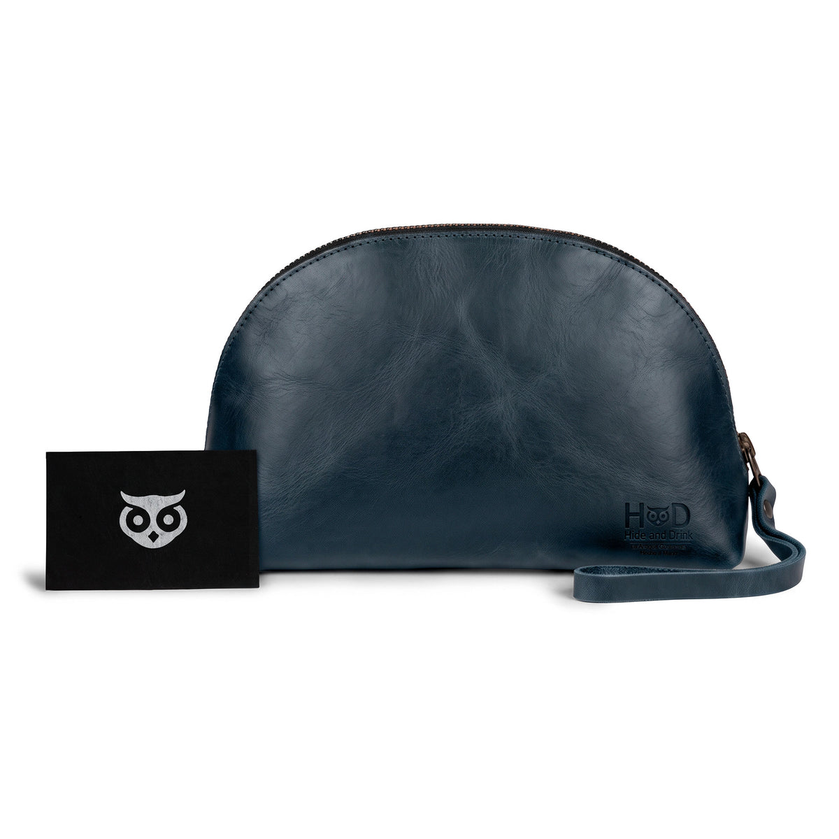 Stylish Accessory Pouch Organizer Hand Bag by Hide & Drink in brown leather, showcasing full grain quality. This Cosmetic Travel Organizer with Hand Strap for Women is ideal as a versatile Makeup Bag or Classic Handbag, showcasing artisan craftsmanship from La Antigua Guatemala & Oaxaca Mexico.
