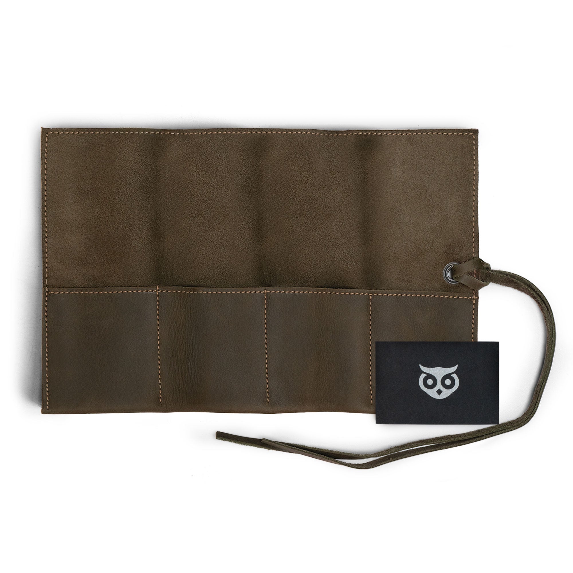 Handmade black Watch Roll by Hide & Drink, holds up to 4 watches. This easy carry Watch Roll Organizer is crafted from full grain leather, representing the beauty of small batch production, hand cut, hand sewn, and fire branded detailing made in La Antigua Guatemala & Oaxaca Mexico.