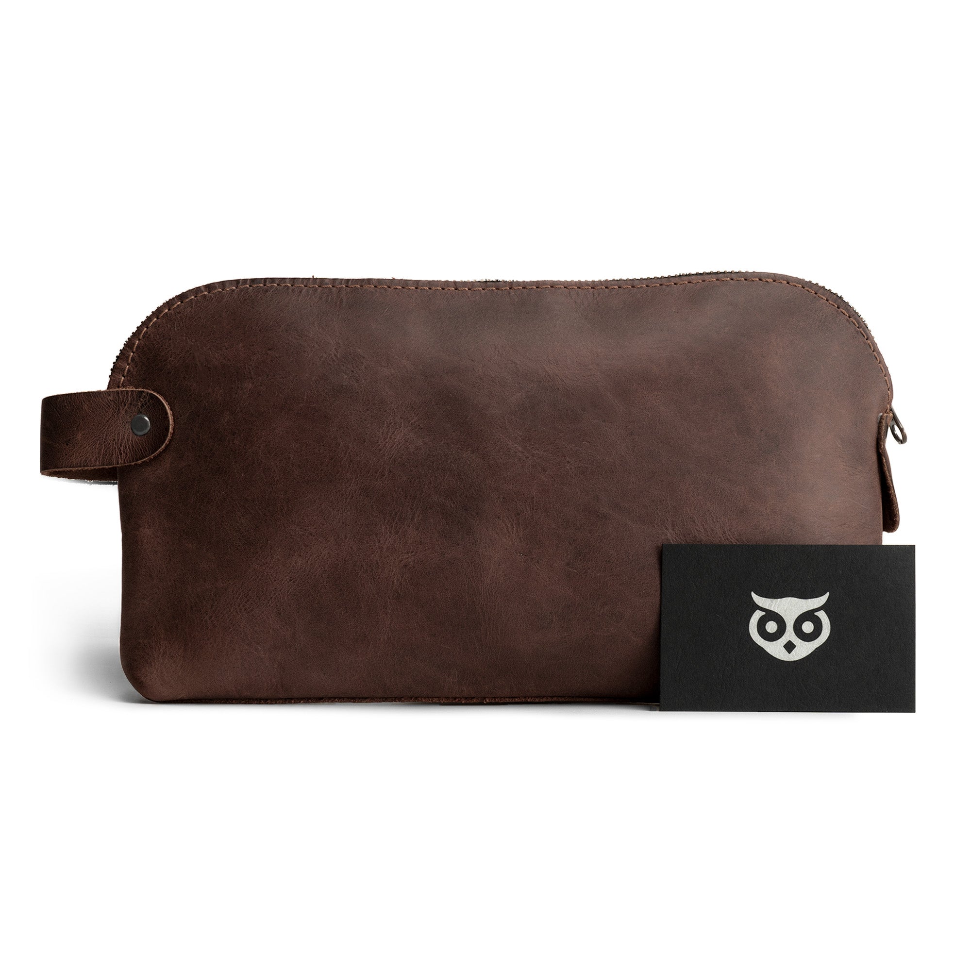 Image of the Dopp Kit Utility Bag by Hide & Drink, featuring a simple yet stylish design perfect for multi-purpose use. This artisan-crafted Dopp Kit Utility Bag is made from full grain leather, reflecting the essence of small batch production and is hand sewn to ensure durability, made in La Antigua Guatemala & Oaxaca Mexico.