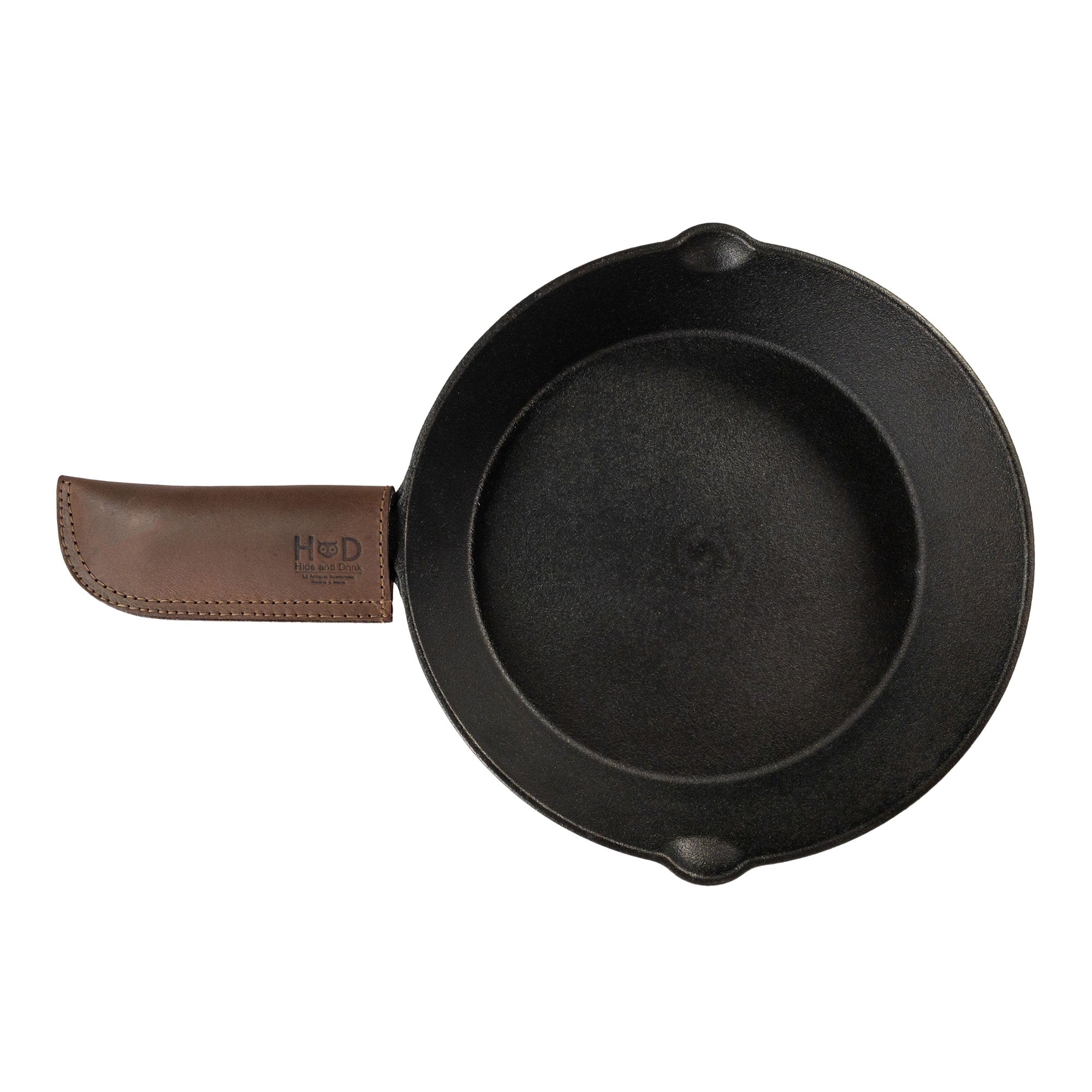 Hot Pan Handle Cover by Hide & Drink, displaying a premium leather finish made for enhanced heat resistance and grip. The artisan product exemplifies small batch production, handmade in La Antigua Guatemala & Oaxaca Mexico.