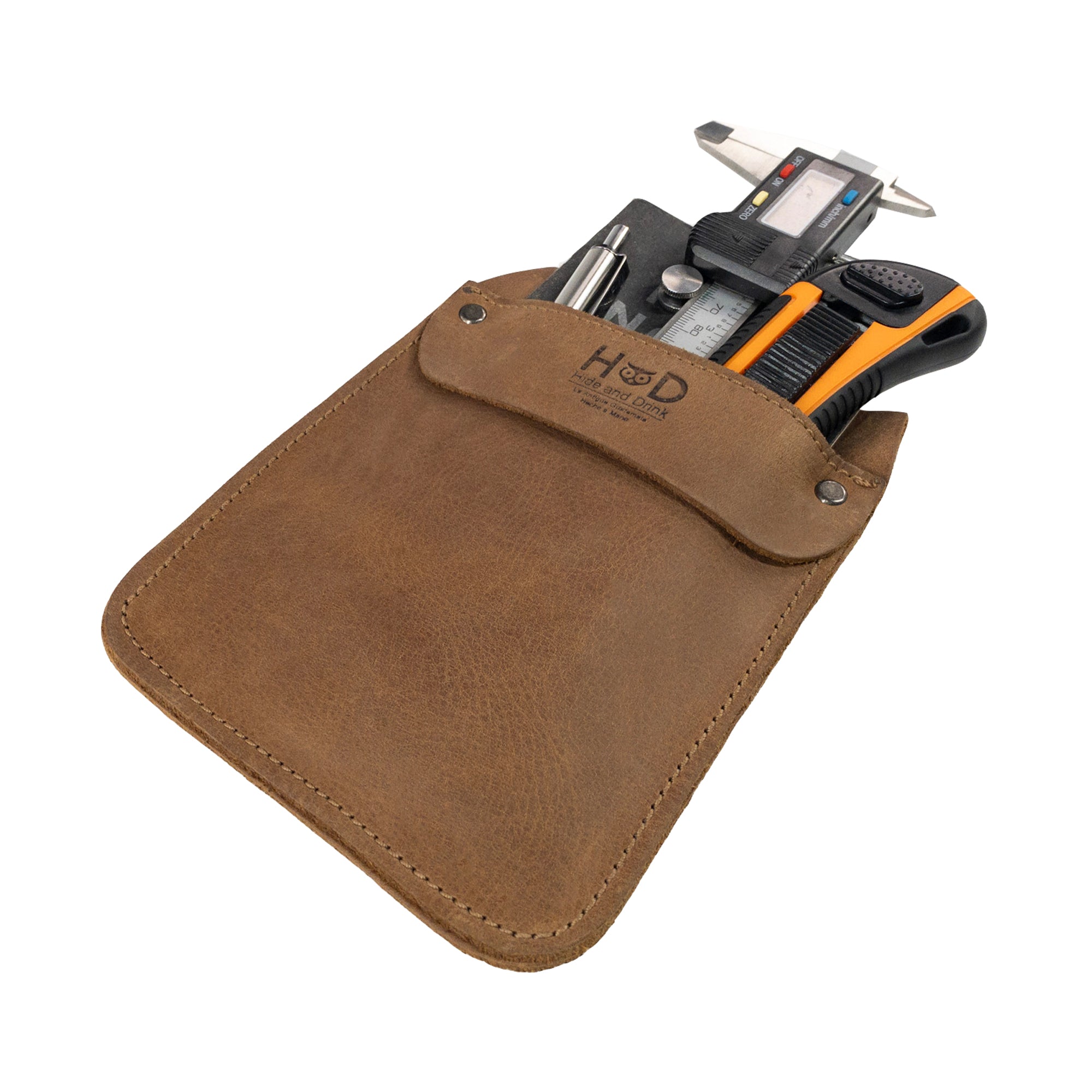 Hide & Drink Leather Work Pocket emphasizing its classic appeal and sturdy construction. This handmade Leather Work Pocket is perfect for anyone looking for durable and stylish tool storage.