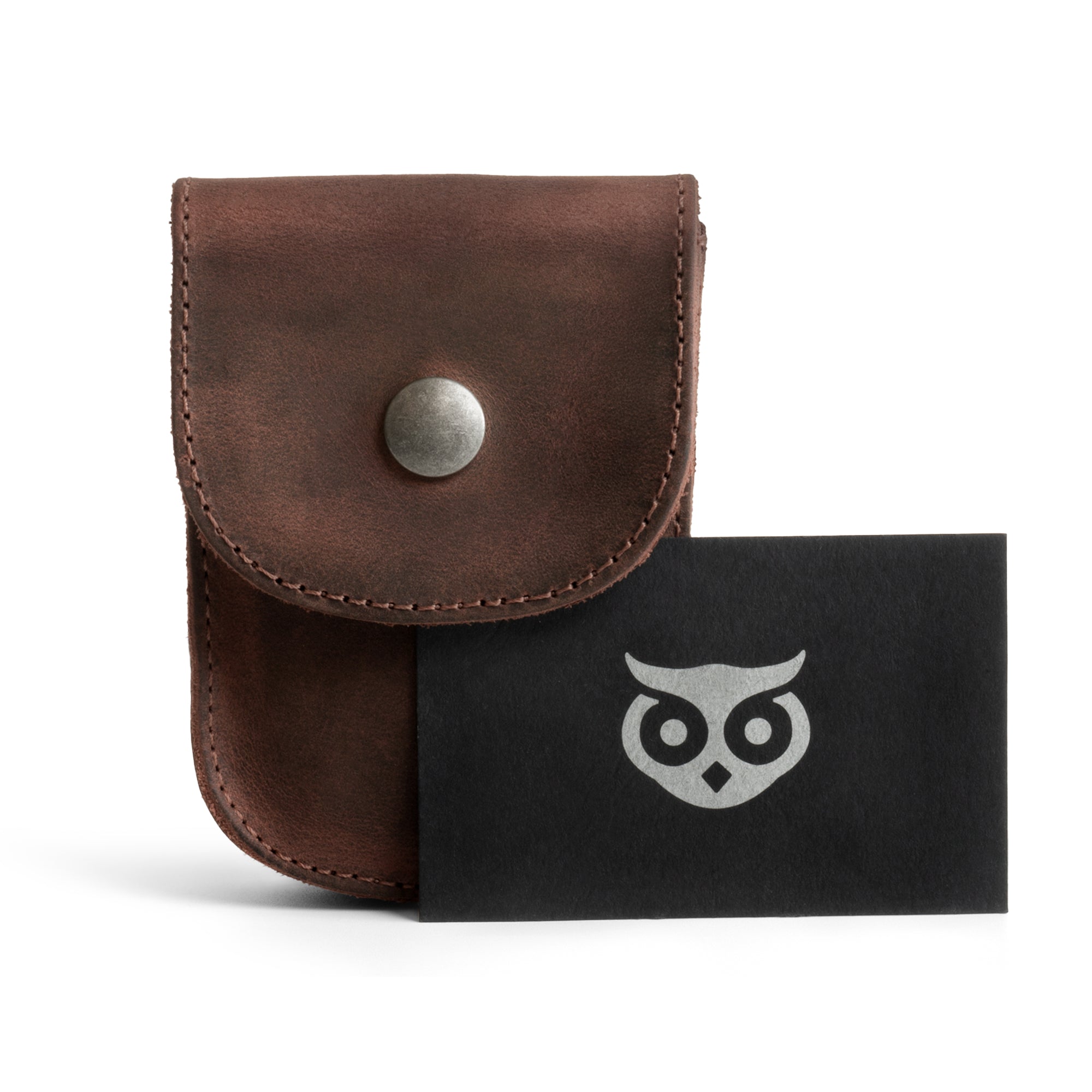 Holster Pouch by Hide & Drink alongside a brand card, highlighting the artisan's craftsmanship and product quality. This stylish pouch made of full grain leather is designed for convenience while attaching to a belt.
