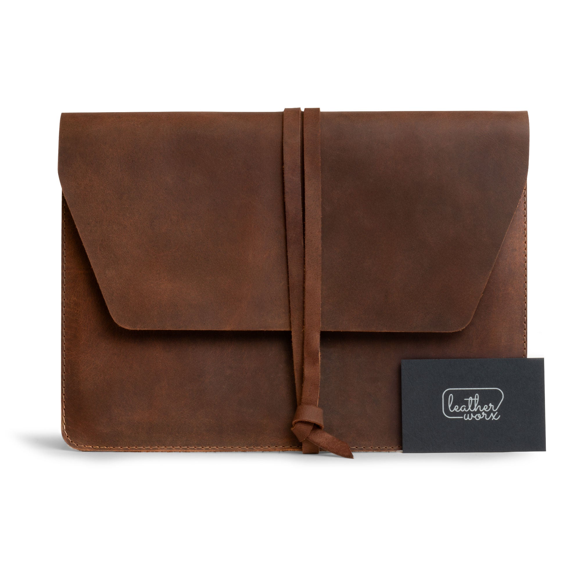 Leather Worx Envelope 11-inch Tablet Cover with a stylish tie closure, ideal for the iPad Air 11 Inch Case Leather (2024) and featuring a convenient pencil slot for the Apple Pencil. This elegant envelope sleeve is crafted from full grain leather, balancing sophistication and practicality for the 5th Generation Tablet with M2 Chip. Handmade in La Antigua Guatemala & Oaxaca Mexico, it showcases artisan quality through small batch production and fire branded details.