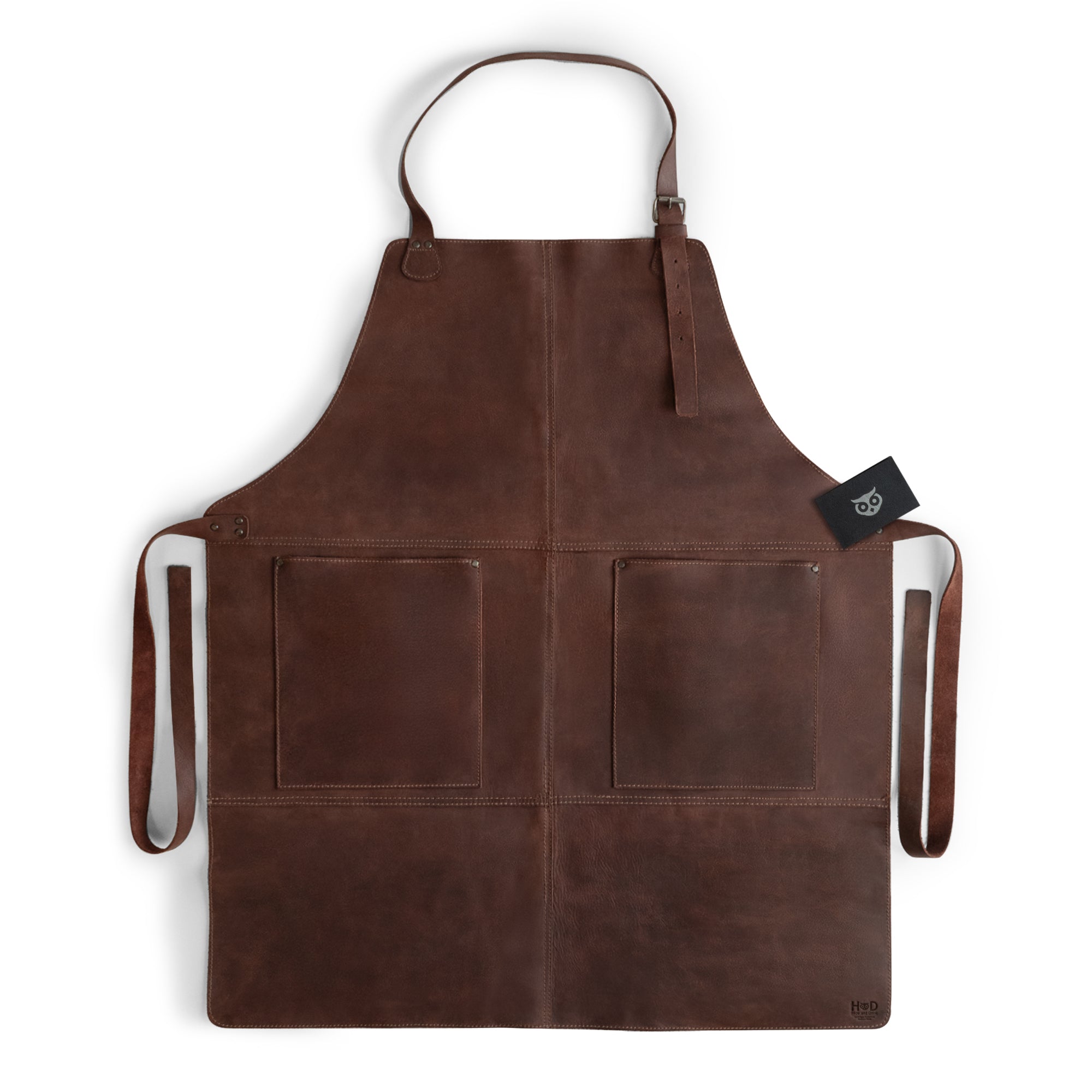 Hide & Drink Leather Apron in a stylish profile view featuring multiple large pockets for tools, made from premium full grain leather. A versatile Leather Apron that embodies craftsmanship and quality.