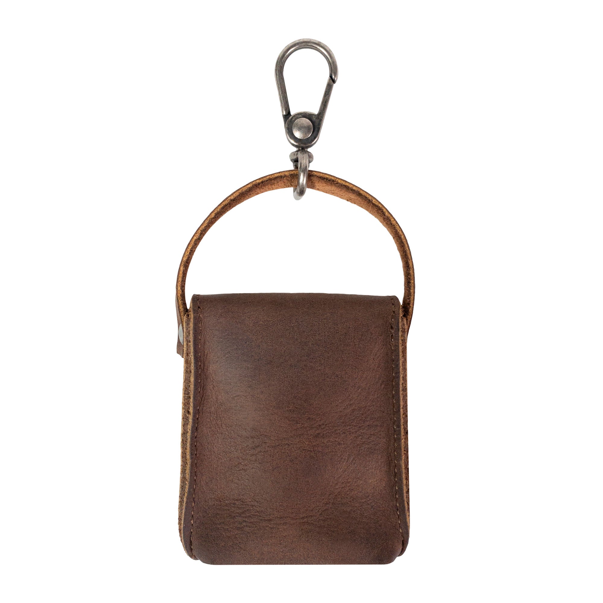 Heather's Mini Purse-Shaped Keychain with a simple clip design, showing its versatility. This mini purse keychain for women, made from durable full grain leather, acts as a vintage keyring holder and highlights the artisan skills from La Antigua Guatemala & Oaxaca Mexico.