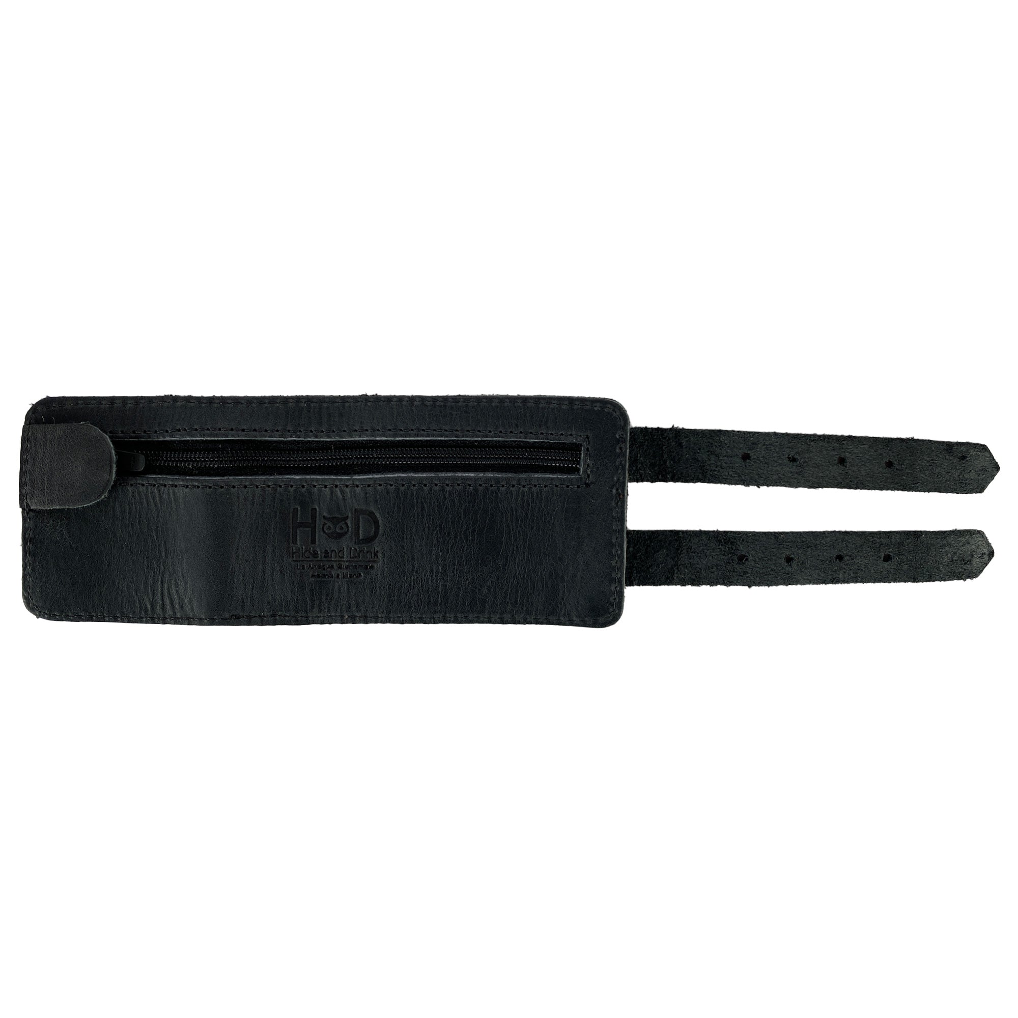 Hide & Drink's Wrist-Wallet-Cuff captured in a stylish angle, displaying its Full Grain Leather construction. This rustic leather bracelet features a hidden pouch for bills and an inner zippered pouch. Artfully handcrafted in La Antigua Guatemala & Oaxaca Mexico, it demonstrates a commitment to artisan craftsmanship and functional design.