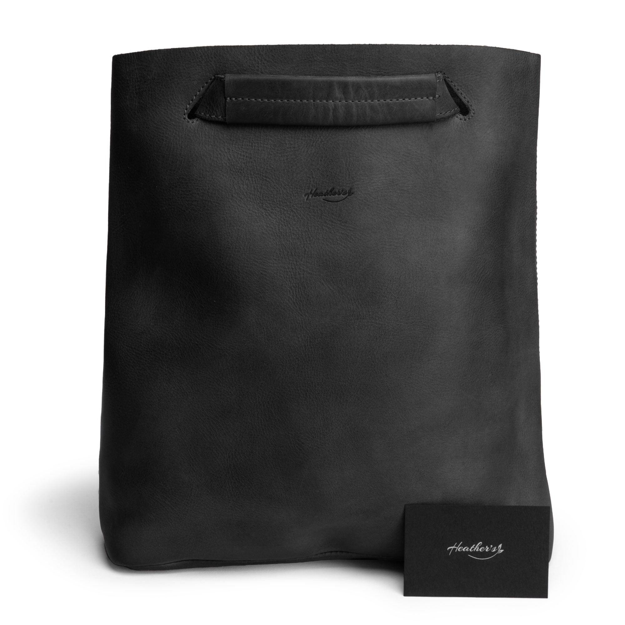 Front view of Heather's Convertible Backpack to Shoulder Bag in black, showcasing its elegant and functional design. Made from Full Grain Leather, this spacious crossbody for women is a perfect combination of style and practicality, representing artisan craftsmanship from La Antigua Guatemala & Oaxaca Mexico.