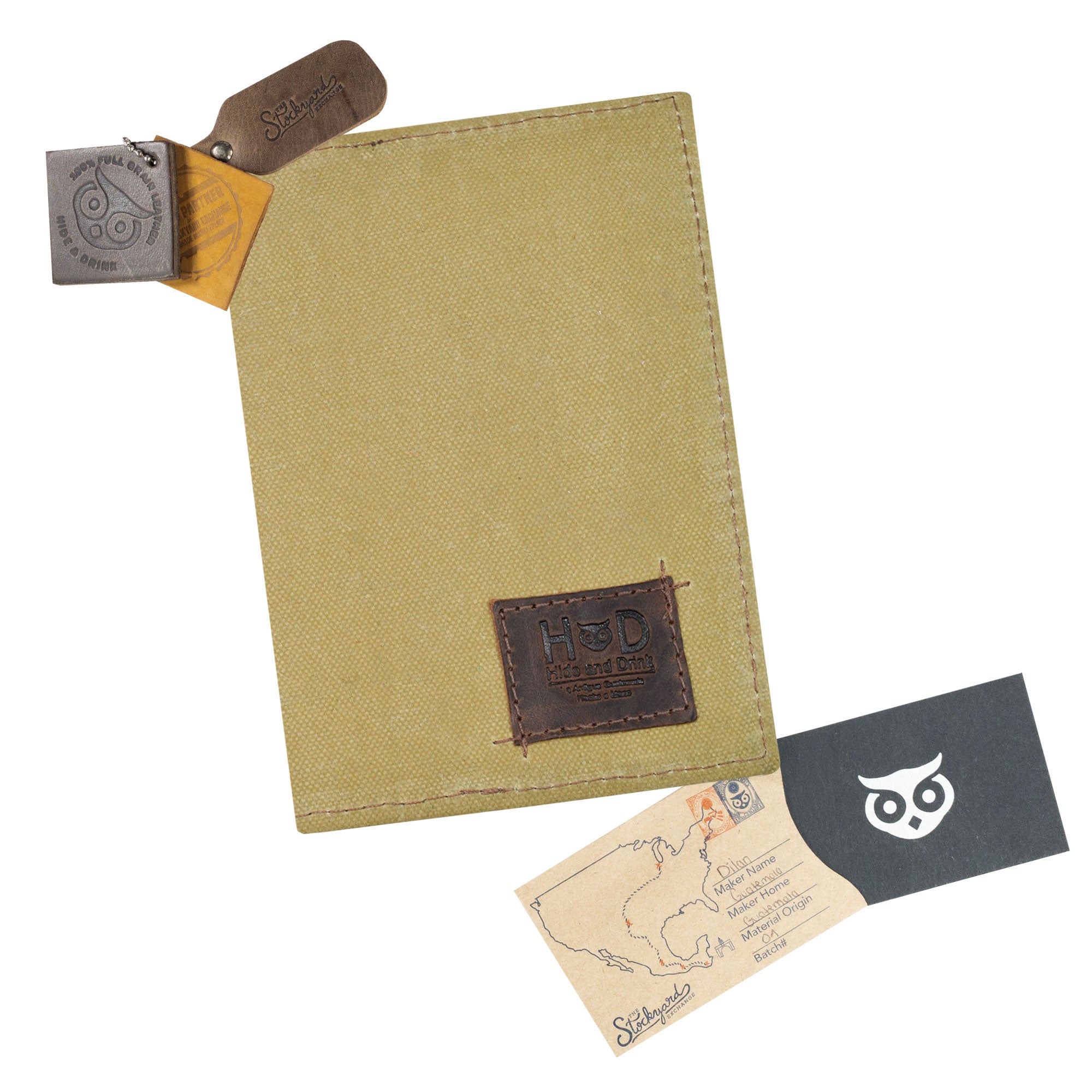 Side view of Hide & Drink Waxed Canvas Field Notes Cover emphasizing the stitching and materials used. This cover is not just a statement piece but also a functional wallet case (3.5 x 5.5 in.) journal cover that every traveler would appreciate.