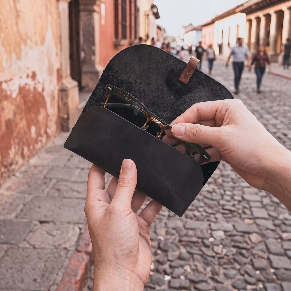 Hide & Drink Sunglass Wrap, designed for functionality and style, features durable full grain leather. This artisan eye glasses storage is perfect for travel, ensuring your sunglasses are safe and secure.