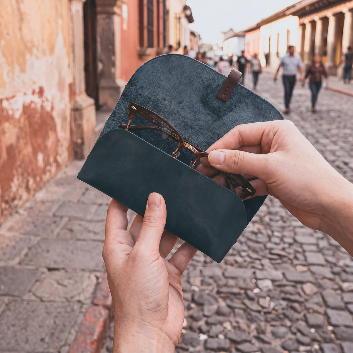 Hide & Drink Sunglass Wrap is an elegant solution for sunglasses storage, crafted from soft full grain leather. This eye glasses storage option is perfect for travel and reflects small batch production with its artisan-made quality.