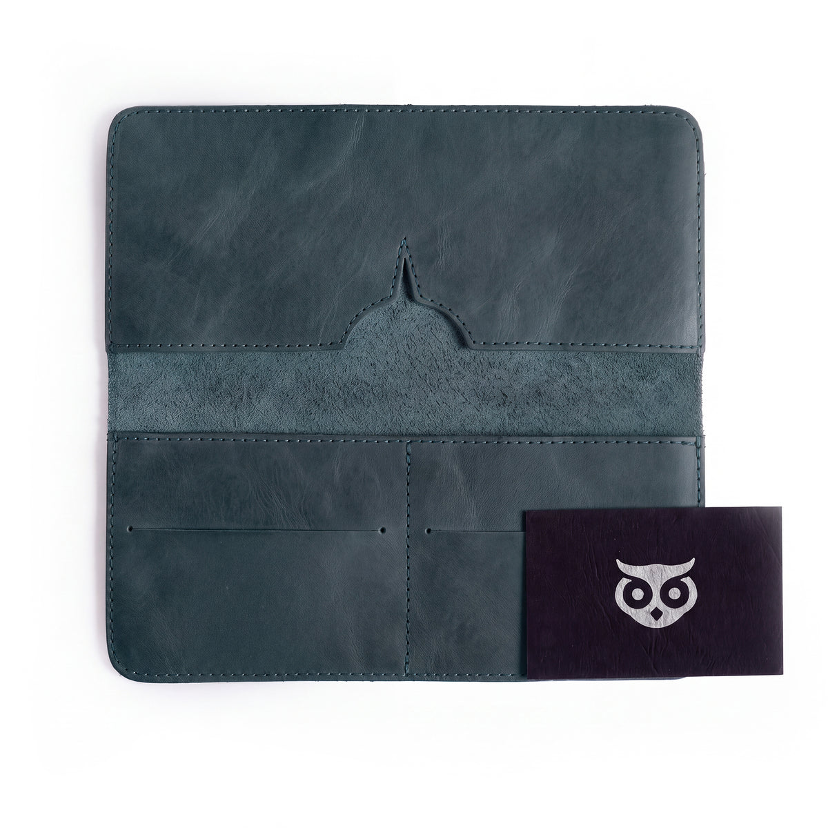 Closed view of the rustic bifold wallet for cellphone by Hide & Drink, highlighting its aesthetic appeal. This Bifold Wallet for Cellphone is expertly crafted from Full Grain Leather, perfect for those who appreciate artisan quality. Made with care and skill through small batch production in La Antigua Guatemala & Oaxaca Mexico.
