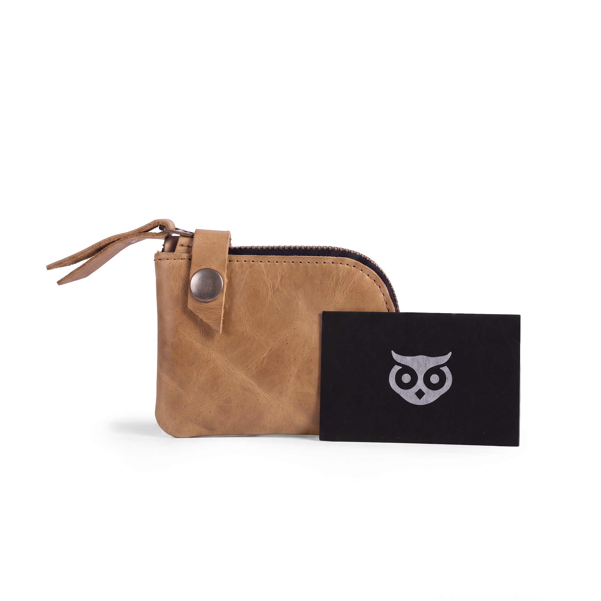 Lion's Mane Zippered Wallet by Hide & Drink showcasing its compact design, a perfect cash holder made of quality materials in an artisan style.