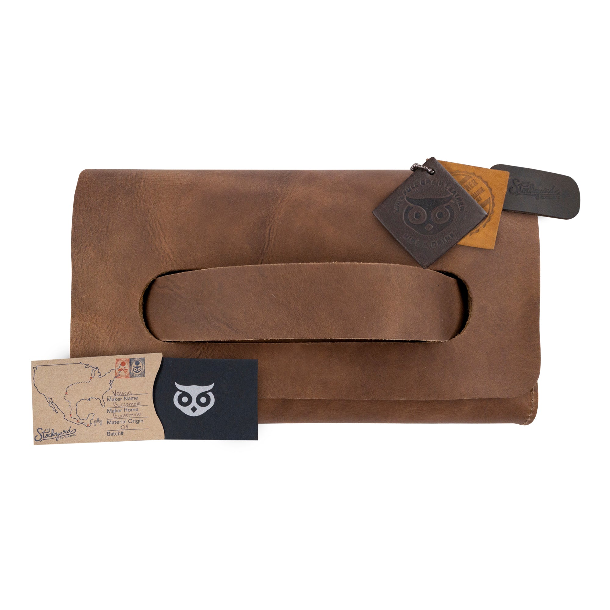 The brown Clutch Bag With Handle from Hide & Drink styled with included accessories. This Full Grain Leather Clutch Bag is a perfect gift for women, handmade through small batch artisan production in La Antigua Guatemala & Oaxaca Mexico.