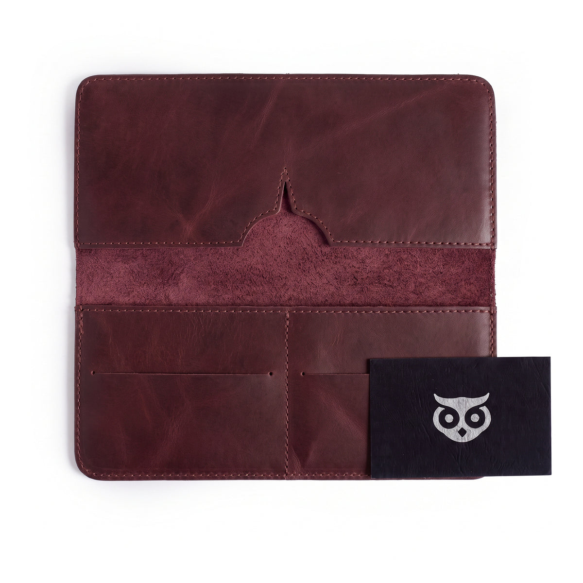 Open bifold wallet for cellphone by Hide & Drink showcasing the logo and product details. This functional Bifold Wallet for Cellphone is made from Full Grain Leather, designed with style and usability in mind. Experience the artisanal quality from small batch production in La Antigua Guatemala & Oaxaca Mexico.