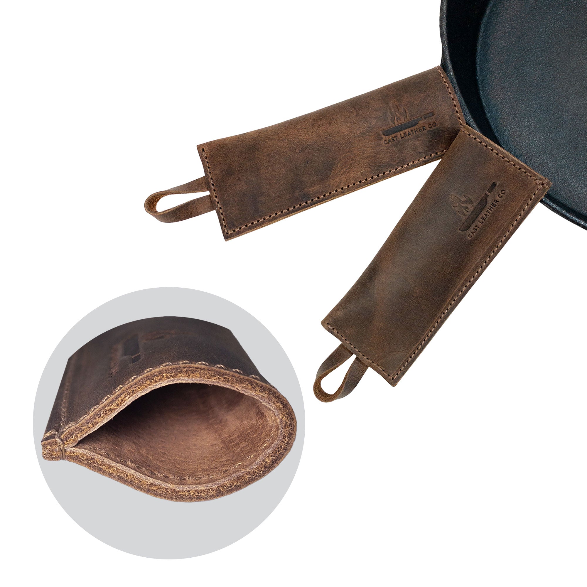 Close-up view of the inside and outside of the Set of 2 Rectangular Pan Handle Covers by Cast Leather Co., highlighting the full grain leather material and design as a sleeve for metal skillet grip. These artisanal kitchen accessories are hand cut, hand sewn, and fire branded, made in La Antigua Guatemala & Oaxaca Mexico.