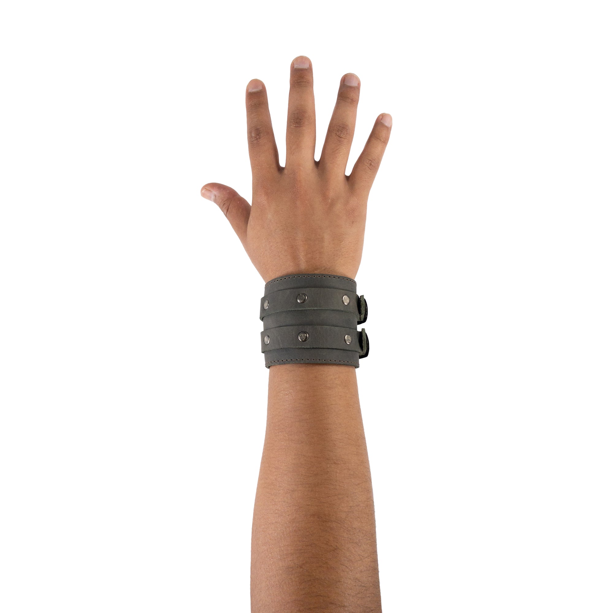 Hide & Drink's stylish Wrist-Wallet-Cuff made from full-grain leather showcases a rustic aesthetic. With a hidden pouch for bills and an inner zippered pouch, this bracelet is both functional and chic. Each piece is handmade in La Antigua Guatemala & Oaxaca Mexico, highlighting artisan craftsmanship and small-batch production.