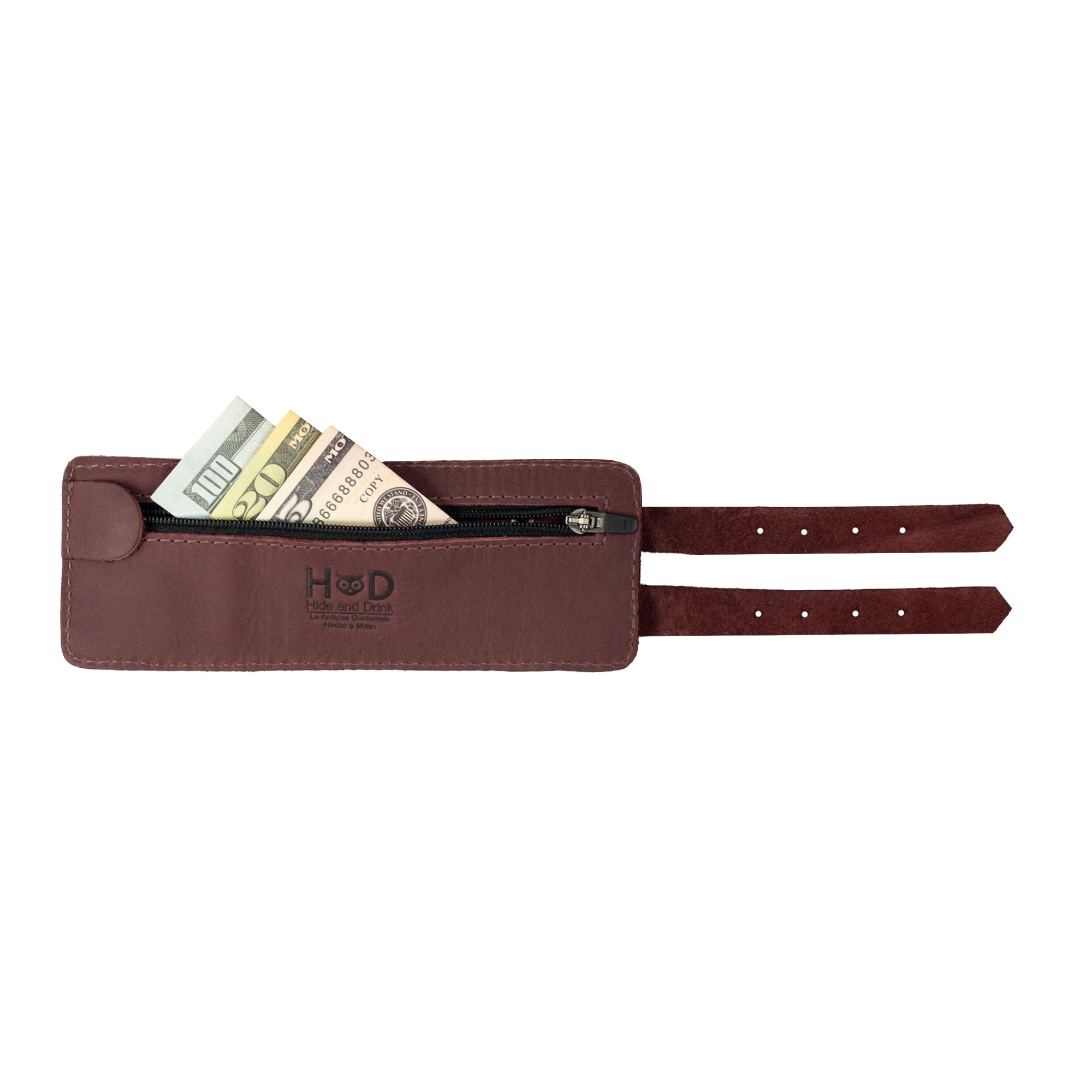 Hide & Drink's Wrist-Wallet-Cuff, crafted in Full Grain Leather, offers a beautiful rustic leather bracelet design. Featuring a hidden pouch for bills and an inner zippered pouch, it combines practicality with elegance. Handcrafted in La Antigua Guatemala & Oaxaca Mexico, each piece reflects artisan quality and attention to detail.