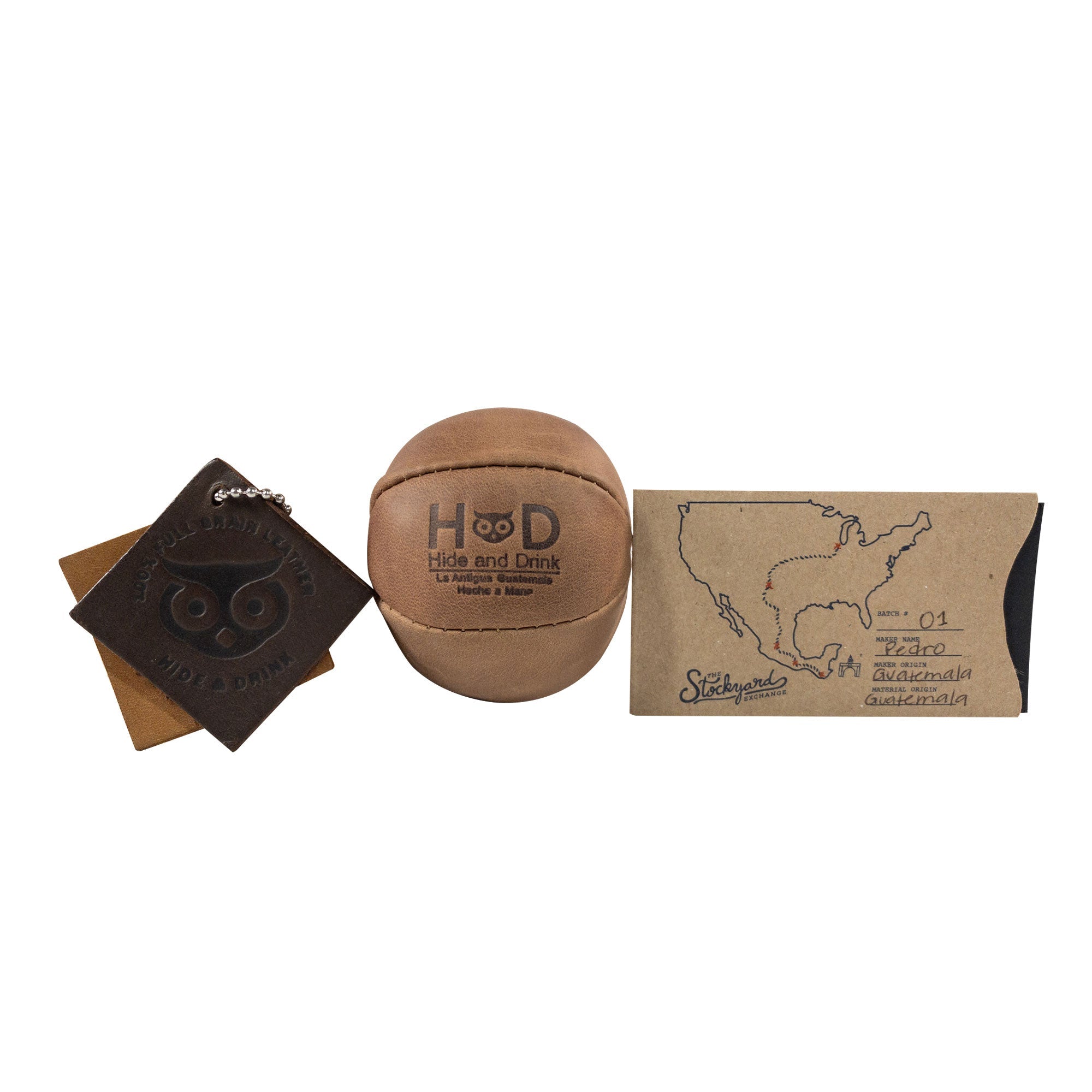 Hide & Drink brown Stress Ball with packaging, illustrating its gift potential for friends and family. This squishy tension accessory is great for relieving fidgeting and anxiety, handcrafted in La Antigua Guatemala.