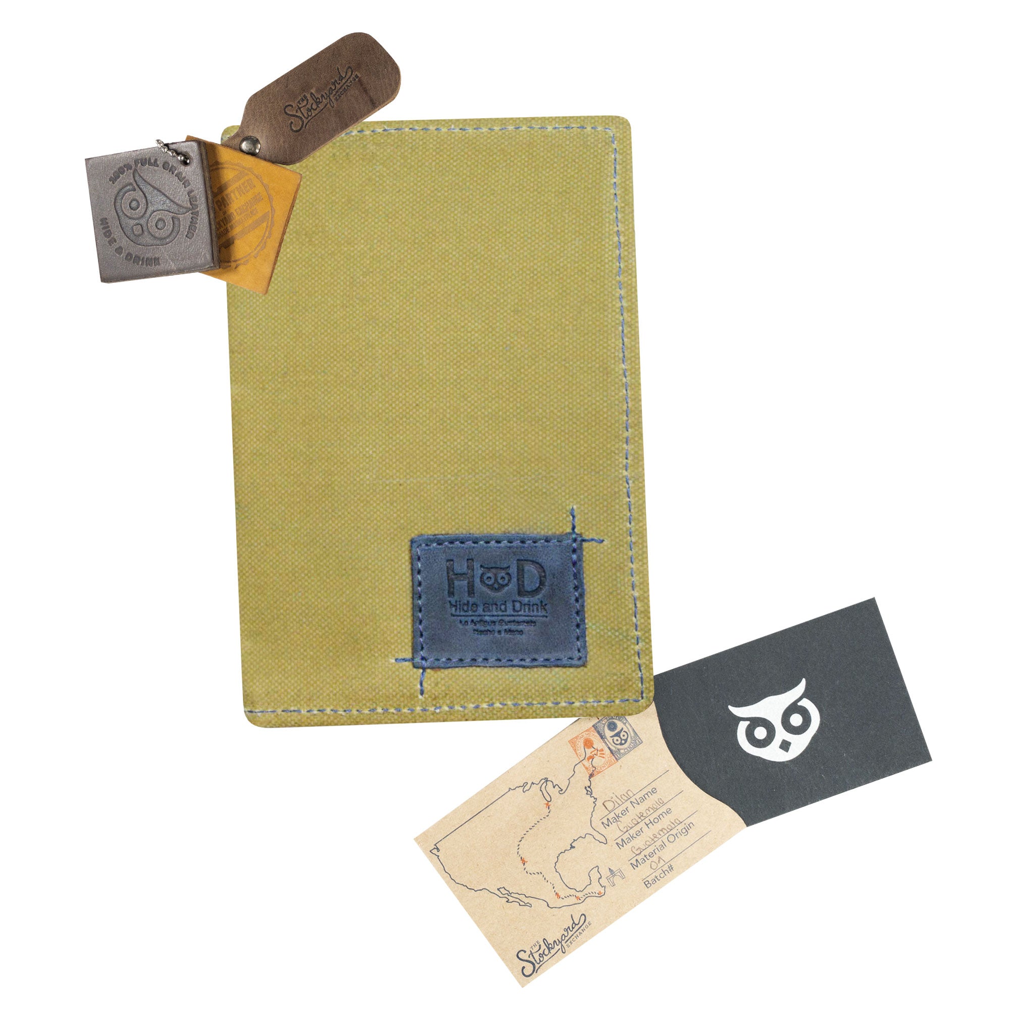 Full view of Hide & Drink Waxed Canvas Field Notes Cover positioned elegantly on a surface, emphasizing its appeal and quality. As a Wallet Case (3.5 x 5.5 in.) Journal Cover, it excels in organization and style, ideal for keeping essential documents tidy.