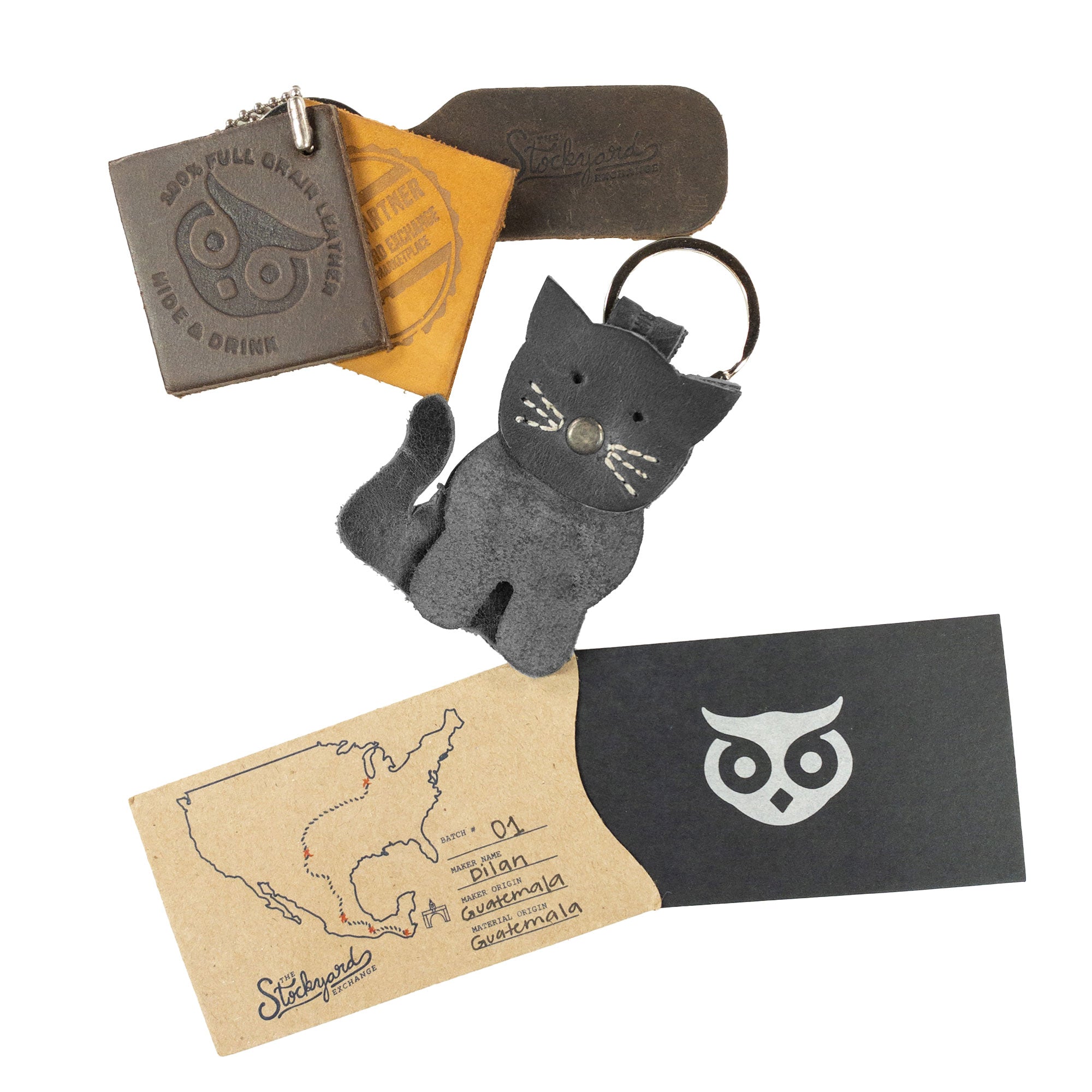 Beautifully packaged Cat Layered Keychain by Hide & Drink, showcasing the artisan craftsmanship and Full Grain Leather quality. This key ring is the perfect little gift for cat lovers. Stylishly functional, making it a must-have accessory for any key holder. StockyardX, Small Batch Production, Hand Cut, Hand Sewn, Fire Branded, Artisan, Handmade in La Antigua Guatemala & Oaxaca Mexico.