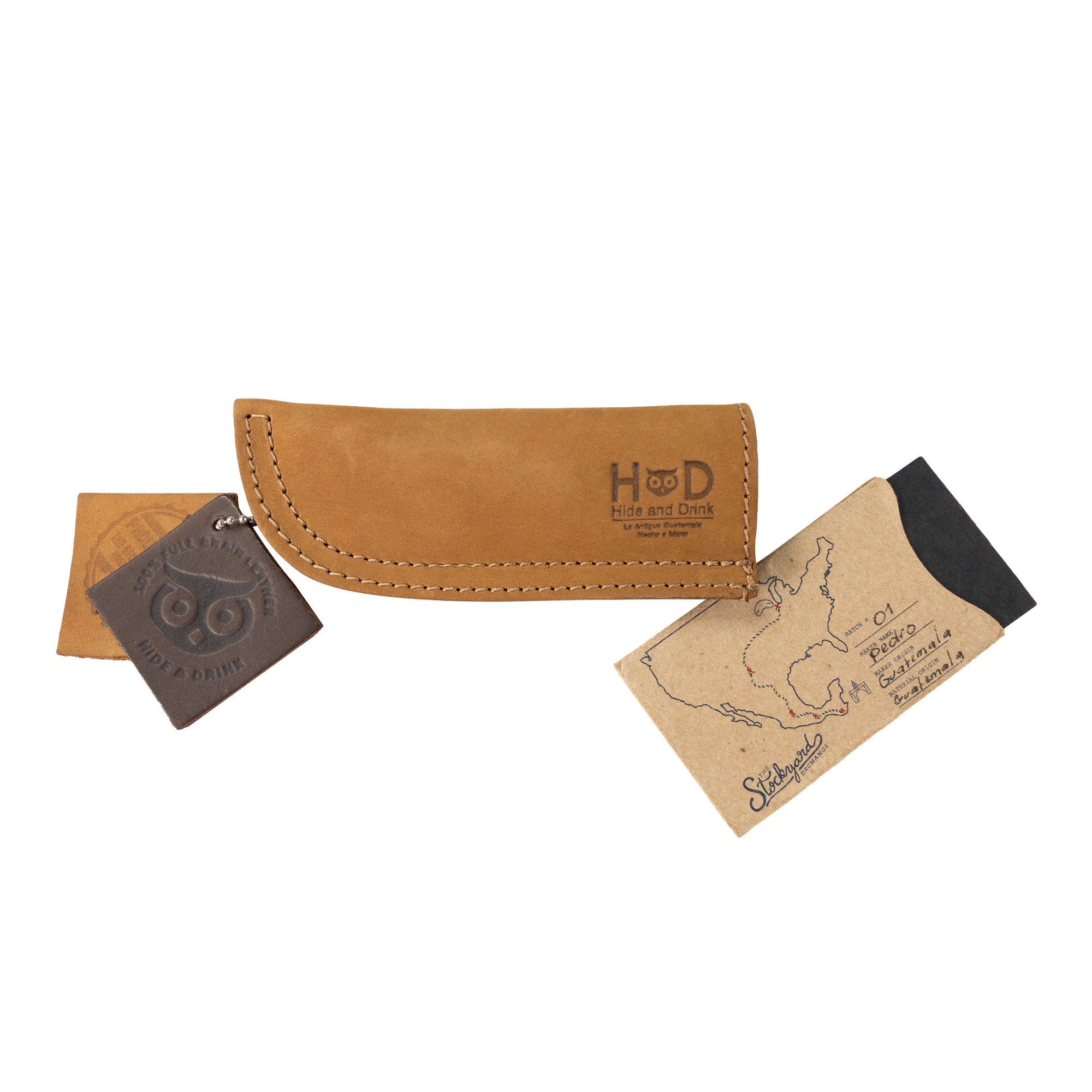 Hide & Drink Cast Iron Panhandle Cover shown with its dimensions and impressive design. This artisan hot handle protector is made from durable, double stitched full grain leather, ensuring safety while cooking. Handmade in La Antigua Guatemala & Oaxaca Mexico, it reflects artisan craftsmanship.