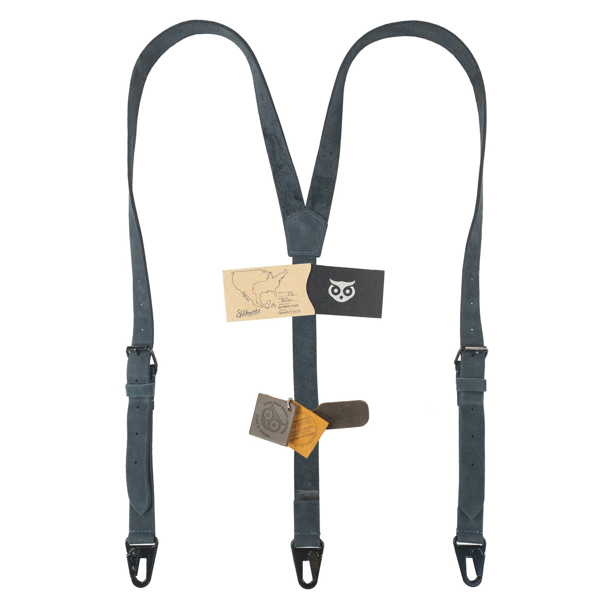 Hide & Drink Rustic Slim Suspenders in blue with tags, highlighting their quality and craftsmanship. A perfect addition to wedding outfits, showcasing handmade work from Guatemala.