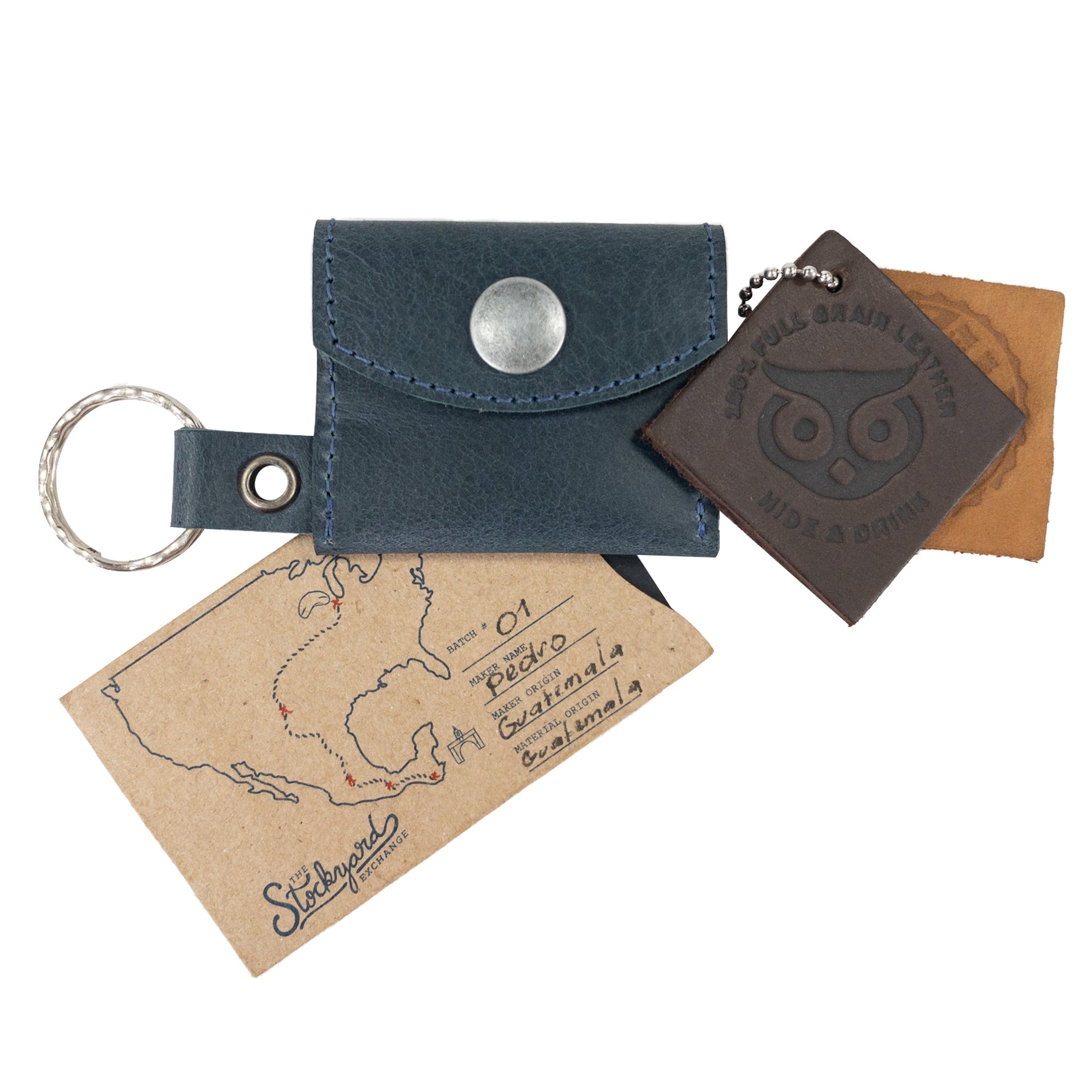 A lifestyle image of the Tiny Coin Holder Keychain by Hide & Drink showcasing its everyday utility in Full Grain Leather. This piece is a proud product of small batch artisan craftsmanship.