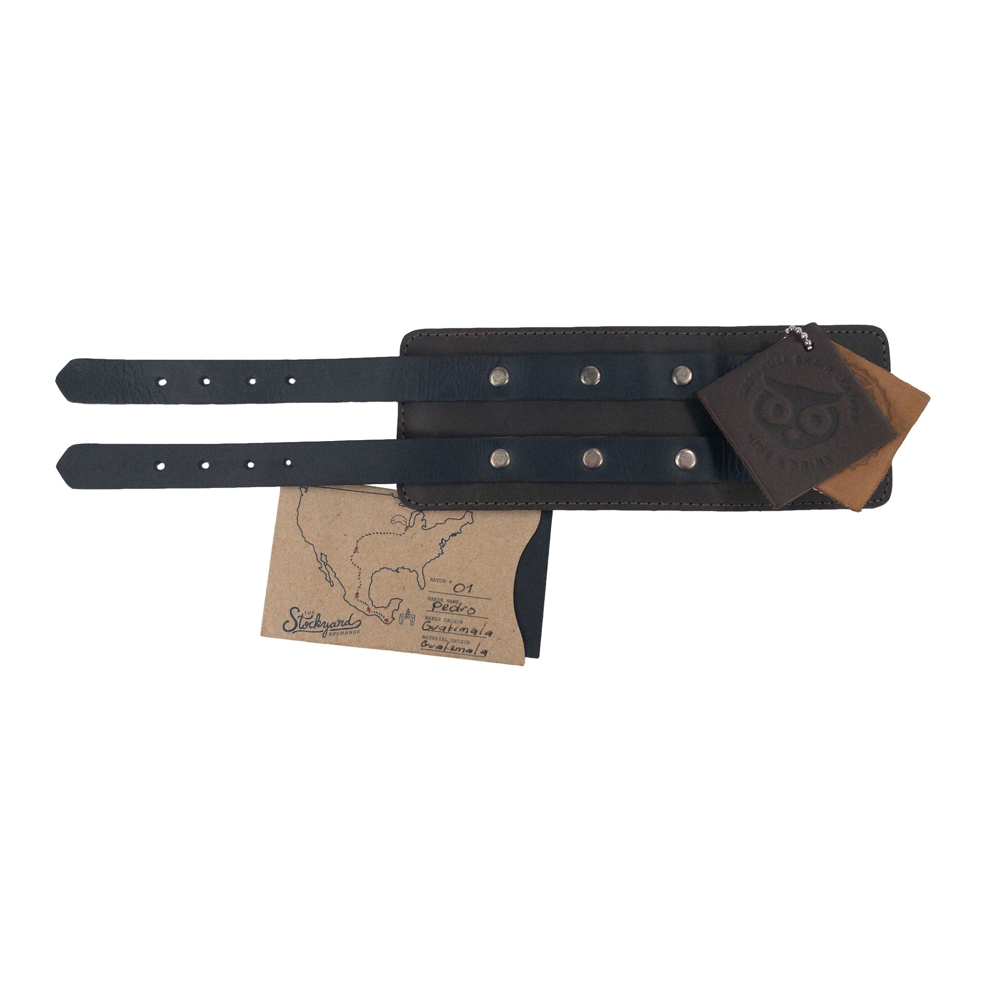 A stylish display shows Hide & Drink's Wrist-Wallet-Cuff crafted from durable Full Grain Leather. This rustic leather bracelet features a hidden pouch for bills and an inner zippered pouch, balancing practicality and style. Artisan-made in La Antigua Guatemala & Oaxaca Mexico, highlighting quality craftsmanship.