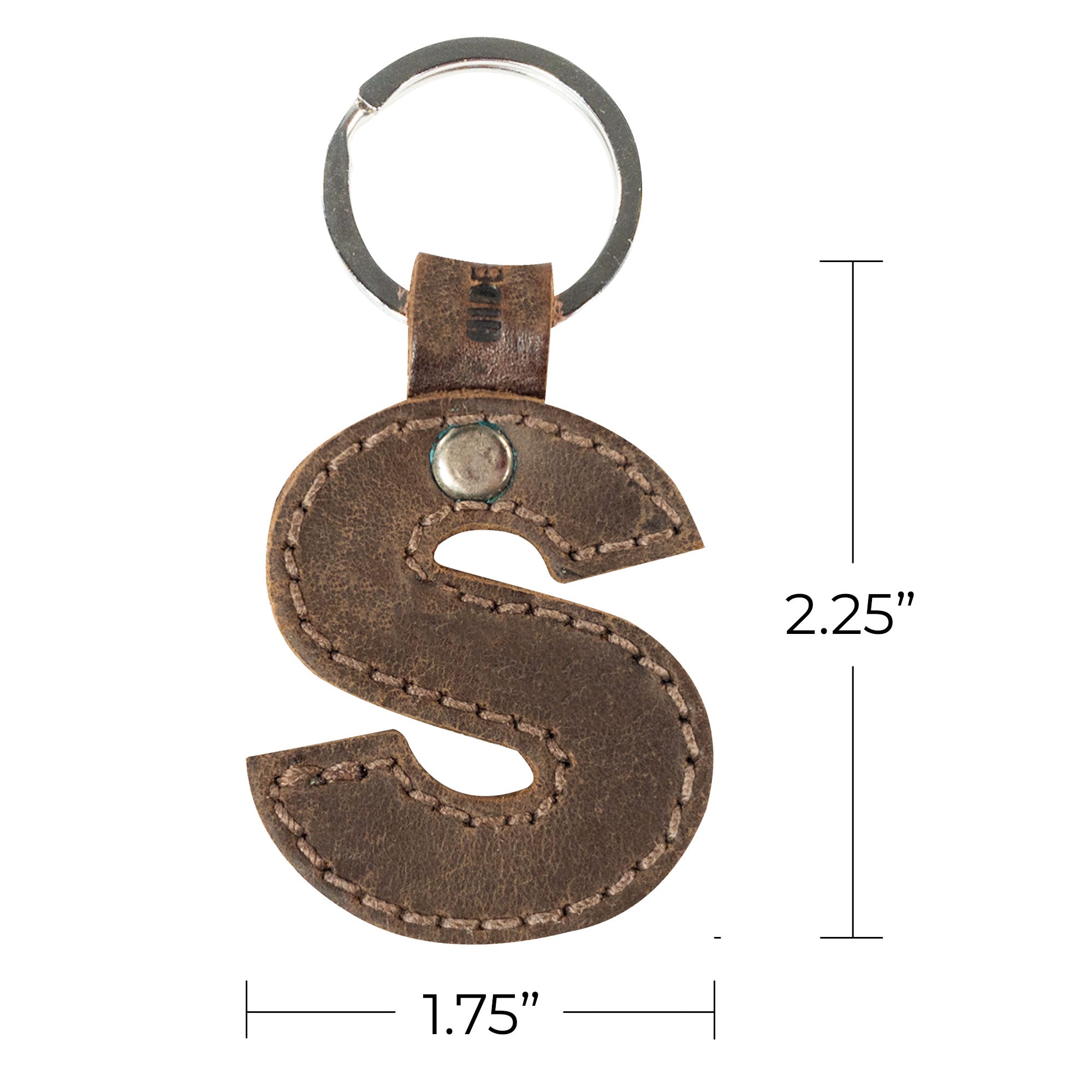 Intricate details of letter S keychain from Hide & Drink. This thick leather Alphabet Letter Keychain embodies the artisan process of small batch craftsmanship in La Antigua Guatemala.