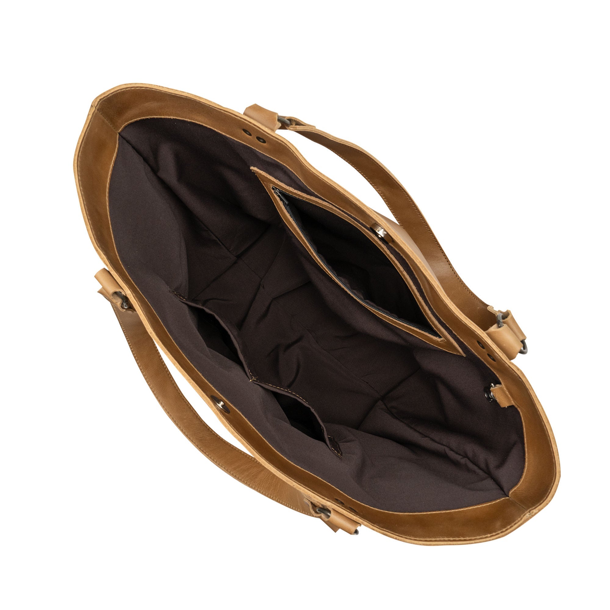 Inside view of the Leather Formal Handbag by Hide & Drink, revealing its spacious compartments and Full Grain Leather craftsmanship. This versatile bag serves as a Female Formal Handbag, Shoulder Bag, or Shopping Bag, and is ideal for girls. Handmade in La Antigua Guatemala & Oaxaca Mexico.