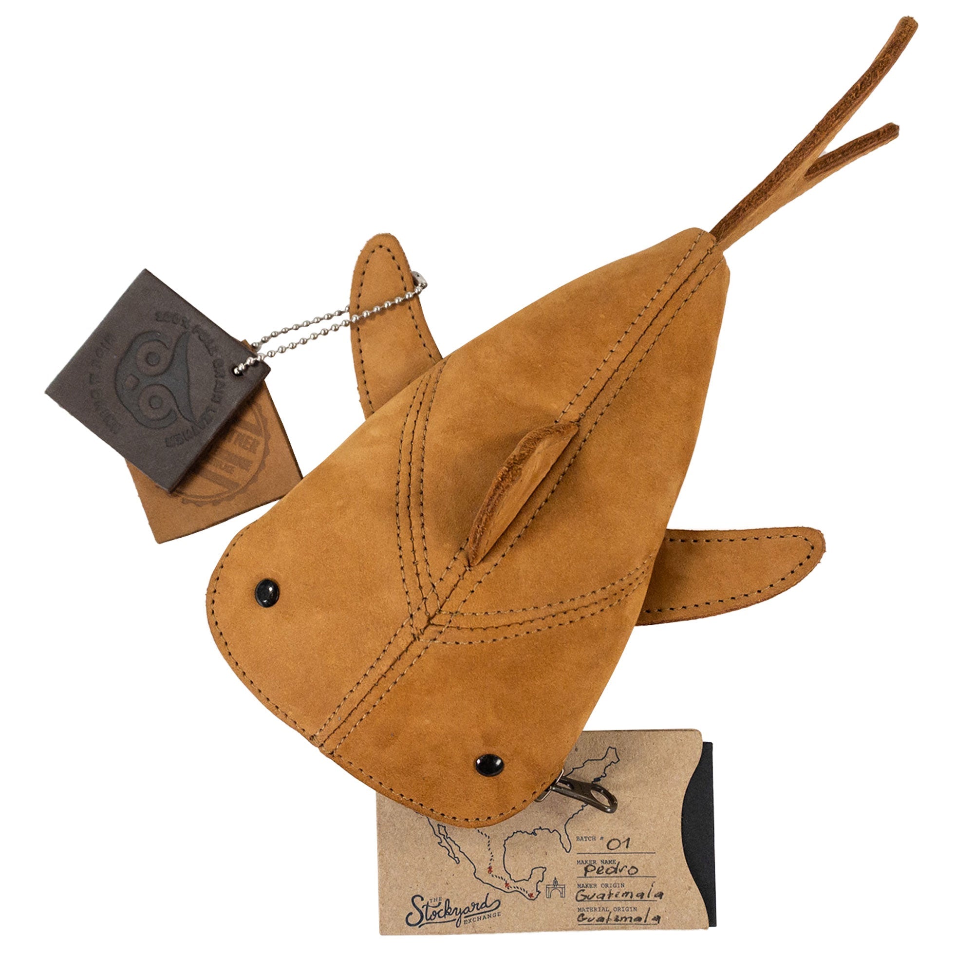 Last view of the green Leather Shark Pouch from Hide & Drink, emphasizing its unique zippered design. This playful shark shaped case is ideal for organized supplies and serves as a stylish pencil purse. Each pouch is artisan made from full grain leather, reflecting the quality of small batch craftsmanship from La Antigua Guatemala & Oaxaca Mexico.