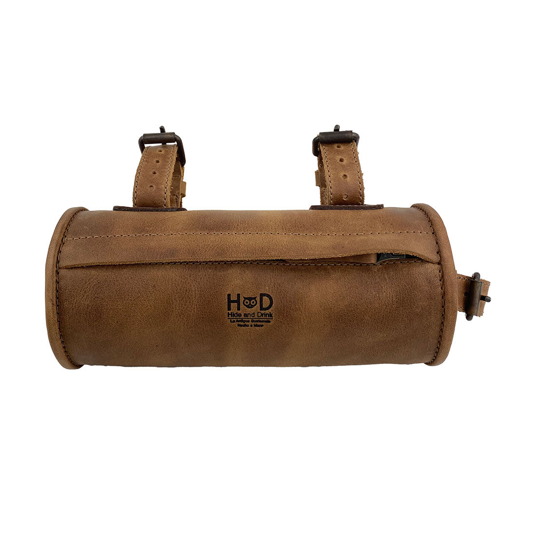Hide & Drink Bike Bag, handcrafted full grain leather cylinder tube pouch designed as a stylish bicycle accessory for secure attachment on frames and handlebars. Features artisan craftsmanship with small batch production, hand cut and hand sewn in La Antigua Guatemala & Oaxaca Mexico.