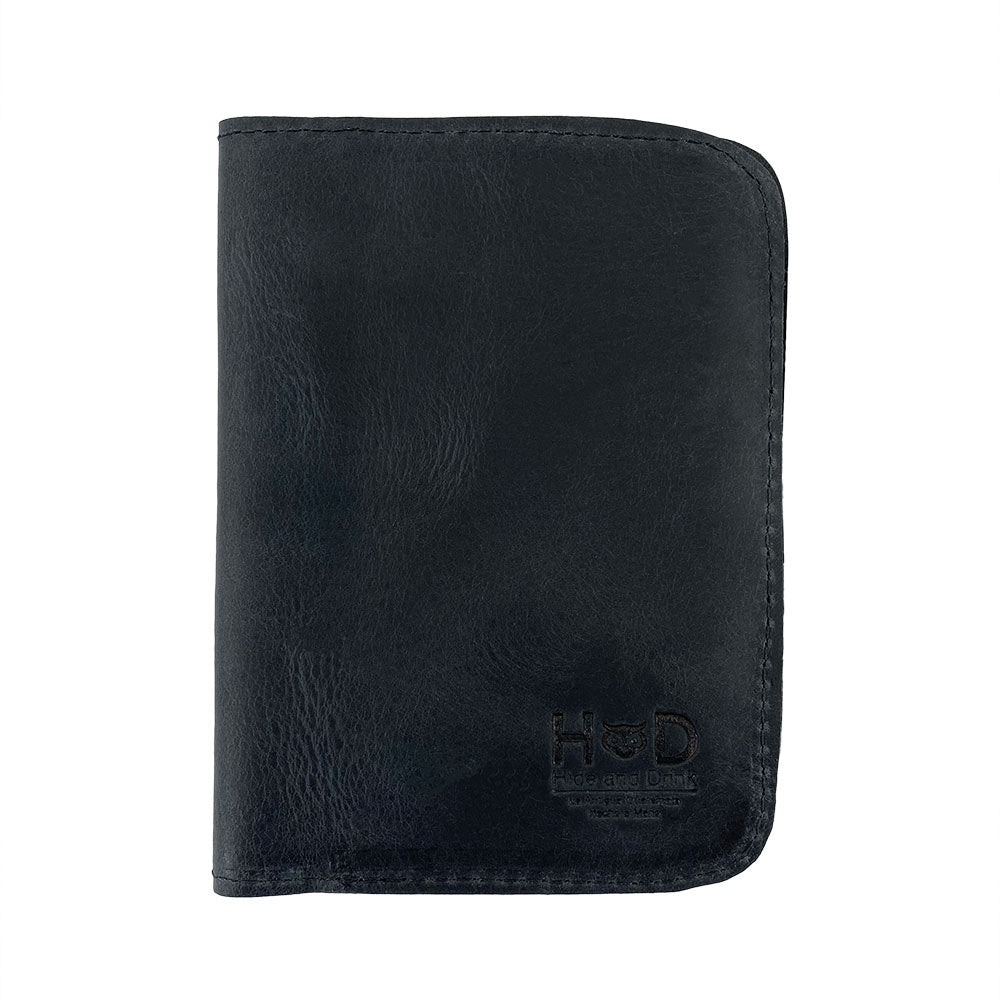Inside layout of the Hide & Drink Travel Wallet, designed for functionality and style. This travel wallet acts as a bifold passport case crafted from durable full grain leather, handmade in La Antigua Guatemala.