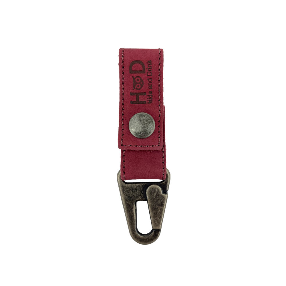Red suede leather version of the Key Ring Holder by Hide & Drink, emphasizing its durability and artisan craftsmanship. Key Ring Holder, Full Grain Leather, StockyardX, Small Batch Production, Hand Cut, Hand Sewn, Fire Branded, Artisan, Handmade in La Antigua Guatemala & Oaxaca Mexico.