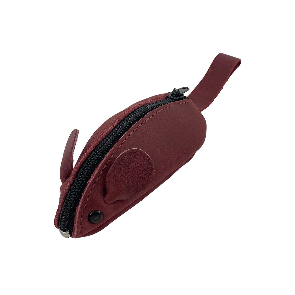Side view of a burgundy Hide & Drink's Mouse Coin Pouch, highlighting its playful ear detail. This artisan-crafted Mouse-Shaped Coin Pouch is a stellar change pouch, perfect for those who appreciate handmade quality.