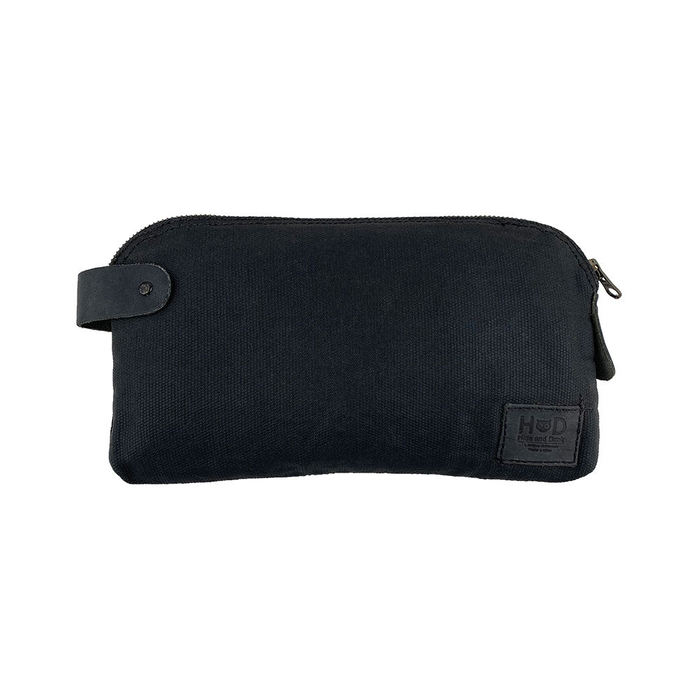 Dopp Kit Utility Bag by Hide & Drink showcasing a chic design with practical applications. This artisan Dopp Kit Utility Bag serves as a perfect travel accessory, made from full grain leather with an emphasis on hand cut and hand sewn artisan craftsmanship, handmade in La Antigua Guatemala & Oaxaca Mexico.