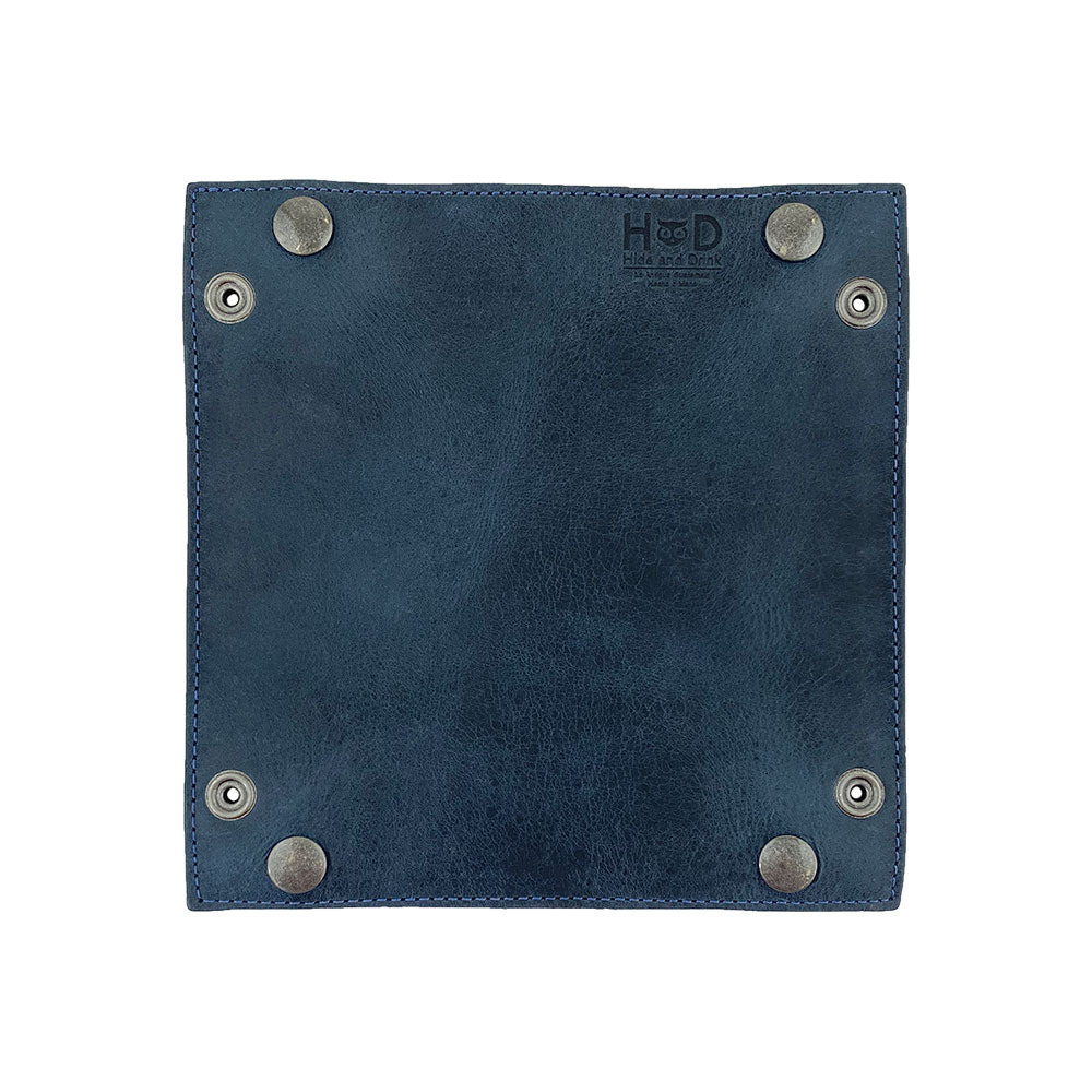 Reverse side of the Valet Tray with Sheep Skin from Hide & Drink in elegant blue leather with rustic brass snaps. This versatile tray doubles as a coin box or catchall for personal items, featuring artisan quality with a hand cut, hand sewn design that showcases small batch production ideals.