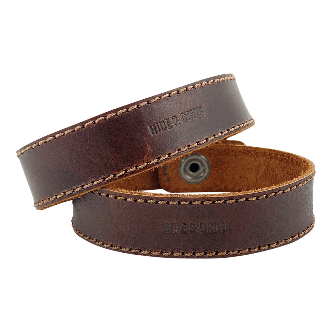 A close-up of the Hide & Drink Chemex Strap Replacement, highlighting its rich Full Grain Leather texture. This strap replaces old ties, adding style to your pour-over routine. Pour Over Strap (2 Pack) Compatible with Chemex 6-Cup Glass, featuring artisan craftsmanship from small batch production, hand cut and hand sewn, fire branded in La Antigua Guatemala & Oaxaca Mexico.