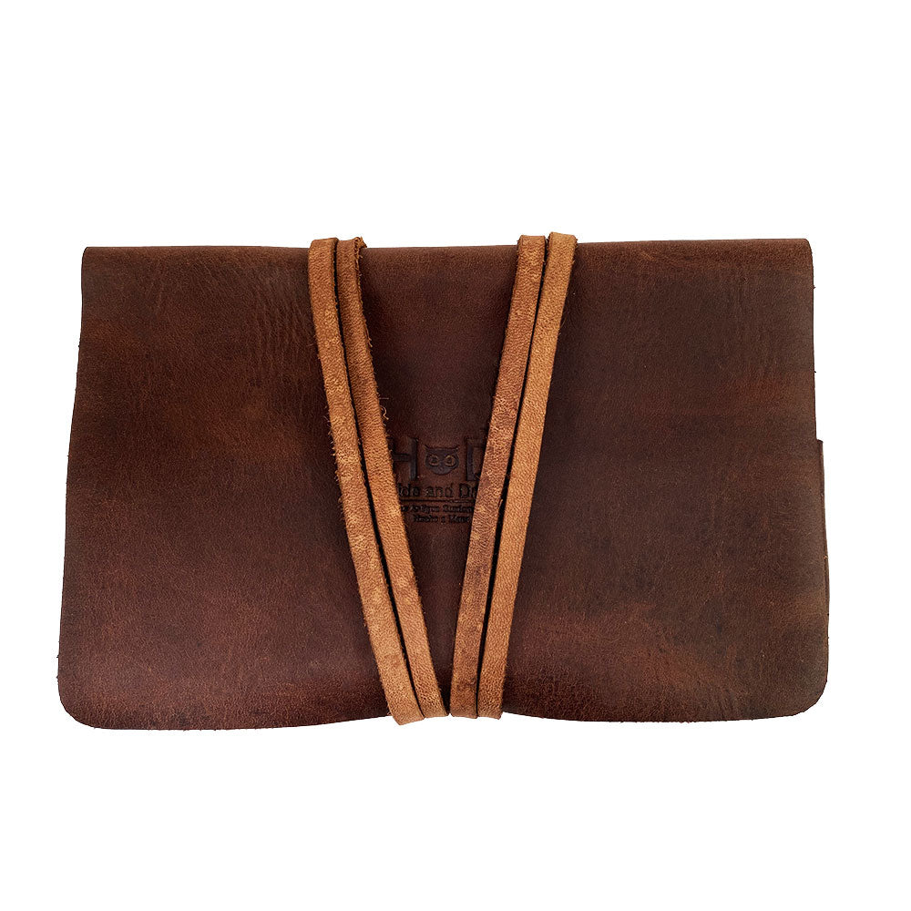 Sleek King Size Tobacco Pouch by Hide & Drink showcasing rich leather texture, made with vintage storage in mind for your tobacco essentials. It represents small batch production and artisan techniques from Guatemala.