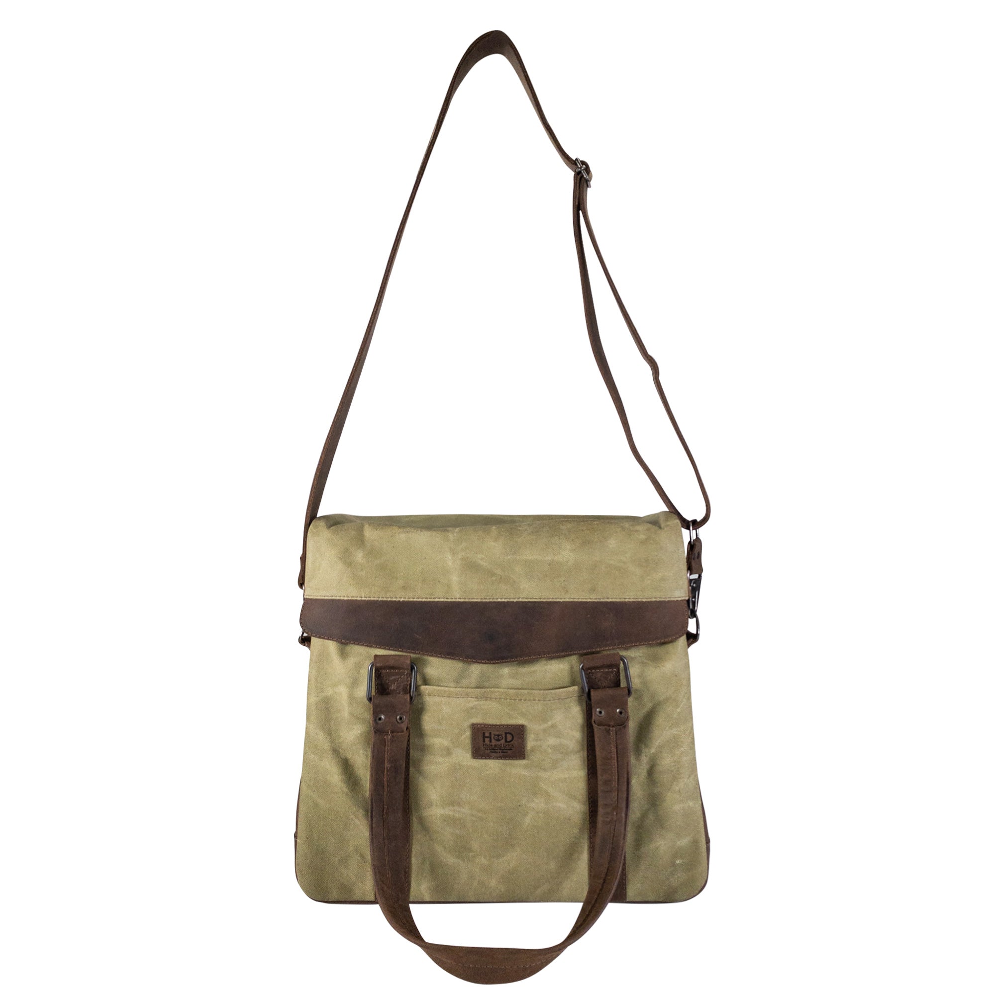 Front view of Hide & Drink's Vinyl Records Messenger Bag, illustrating its stylish and functional design. This handcrafted bag, made from waxed canvas and full grain leather, is perfect for artists on the go, embodying artisan craftsmanship from La Antigua Guatemala & Oaxaca Mexico.