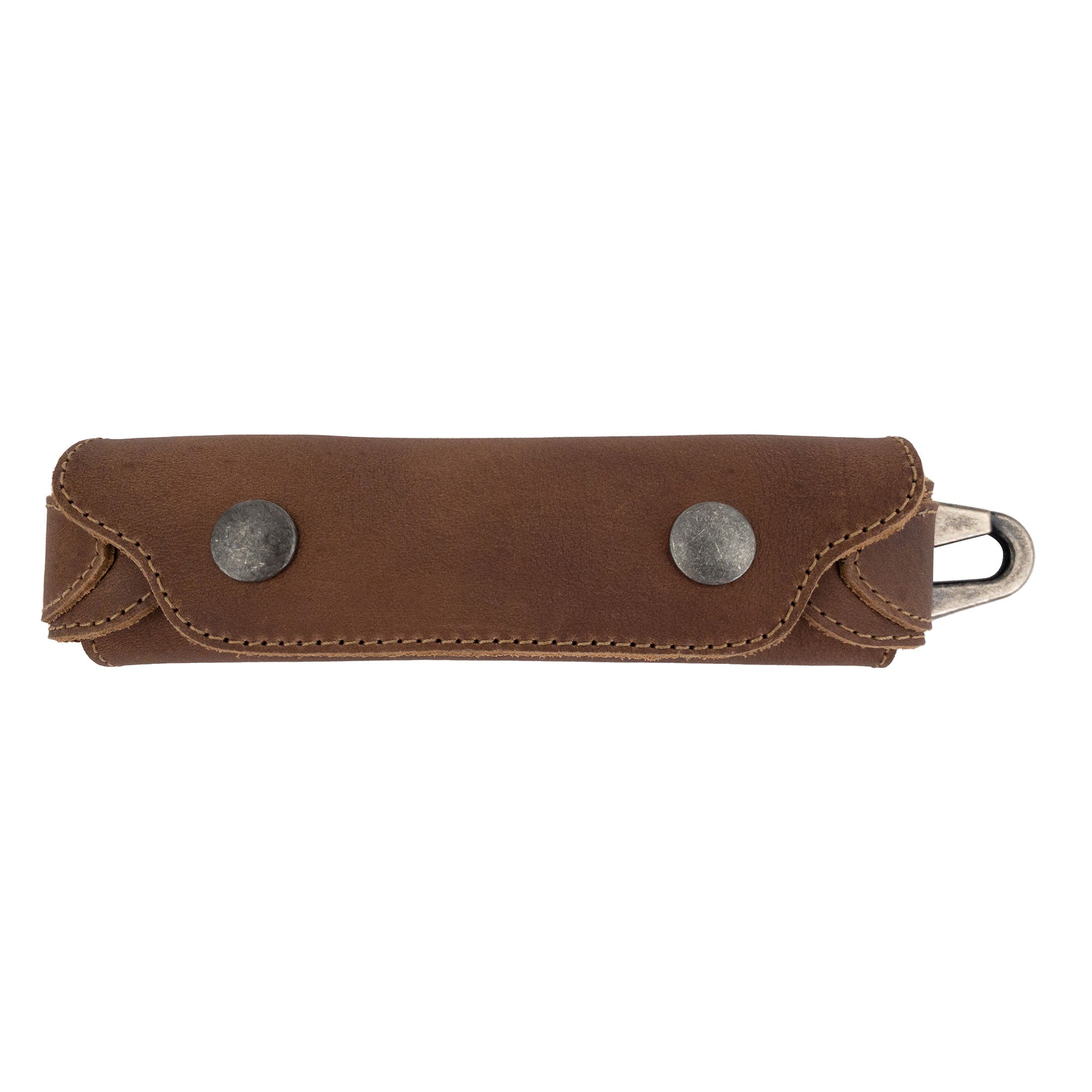 Stylish brown Harmonica Case from Hide & Drink, embodying vintage charm and protective features. Made from full grain leather, it’s perfect for musicians looking for durable and artisan-crafted accessories. Handmade in La Antigua Guatemala.