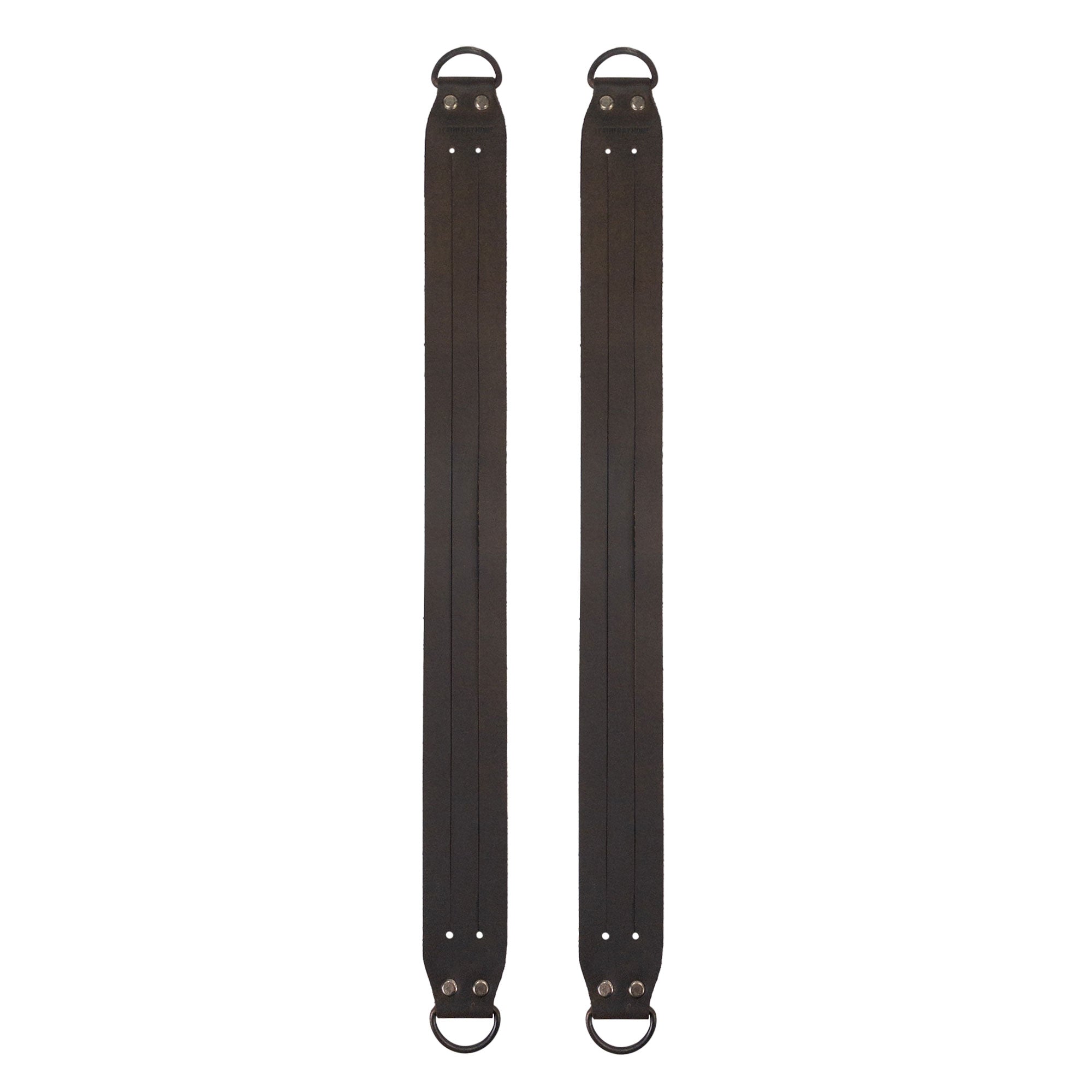 Set of two black Curtain Tie Back with Half Ring (2 Pack) made from Full Grain Leather by Leather At Home. The products showcase small batch production, hand cut, hand sewn craftsmanship, and are fire branded for quality. Artisan-made in La Antigua Guatemala & Oaxaca Mexico.