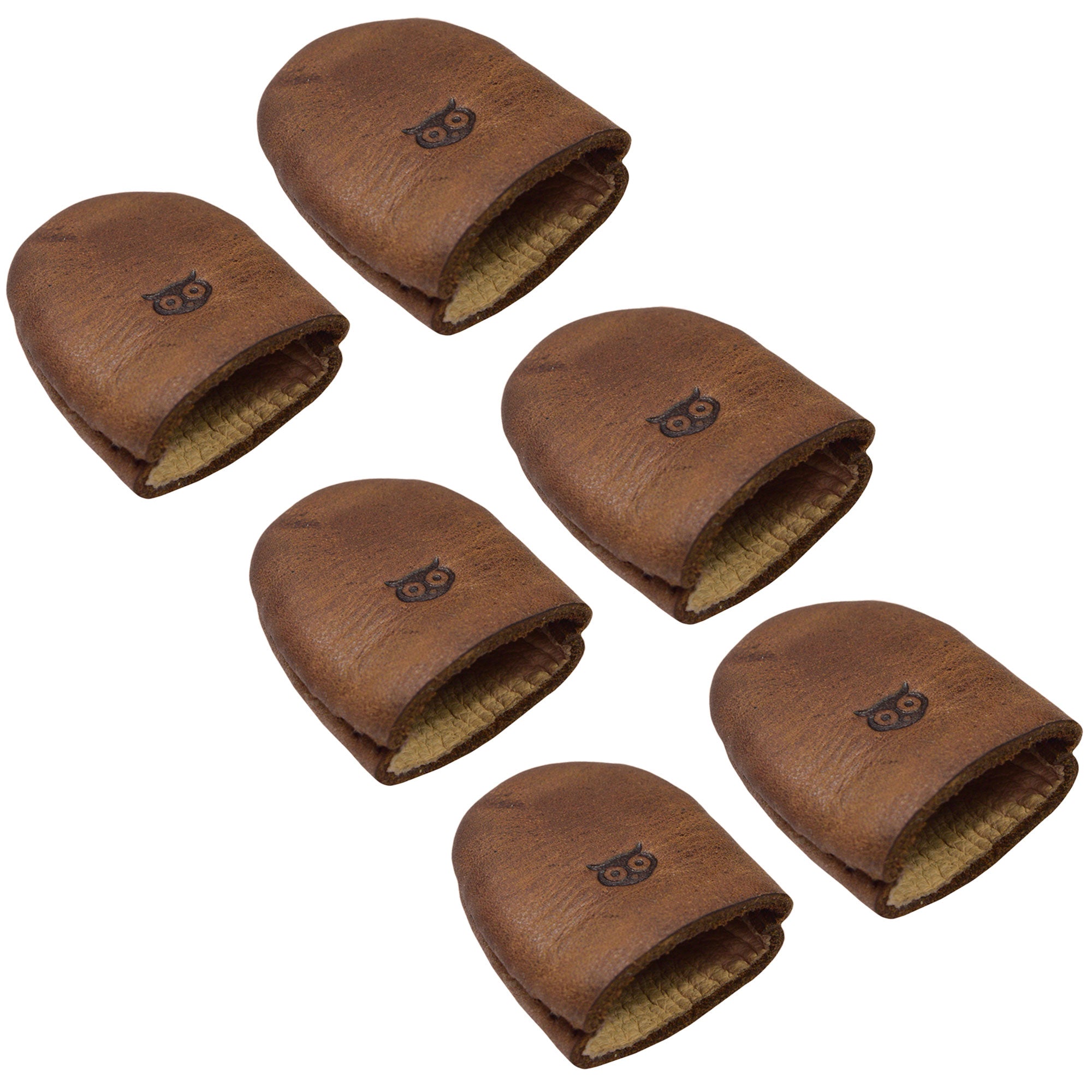 Leather Thimble by Hide & Drink, depicting a Set of 6 Thimbles, perfect as Finger Protectors for crafting projects including Hand Applique & EPP and Quilting Embroidery. Each thimble is made from durable Full Grain Leather, showcasing the quality of Small Batch Production with Hand Cut and Hand Sewn techniques, Fire Branded, and crafted in La Antigua Guatemala & Oaxaca Mexico.