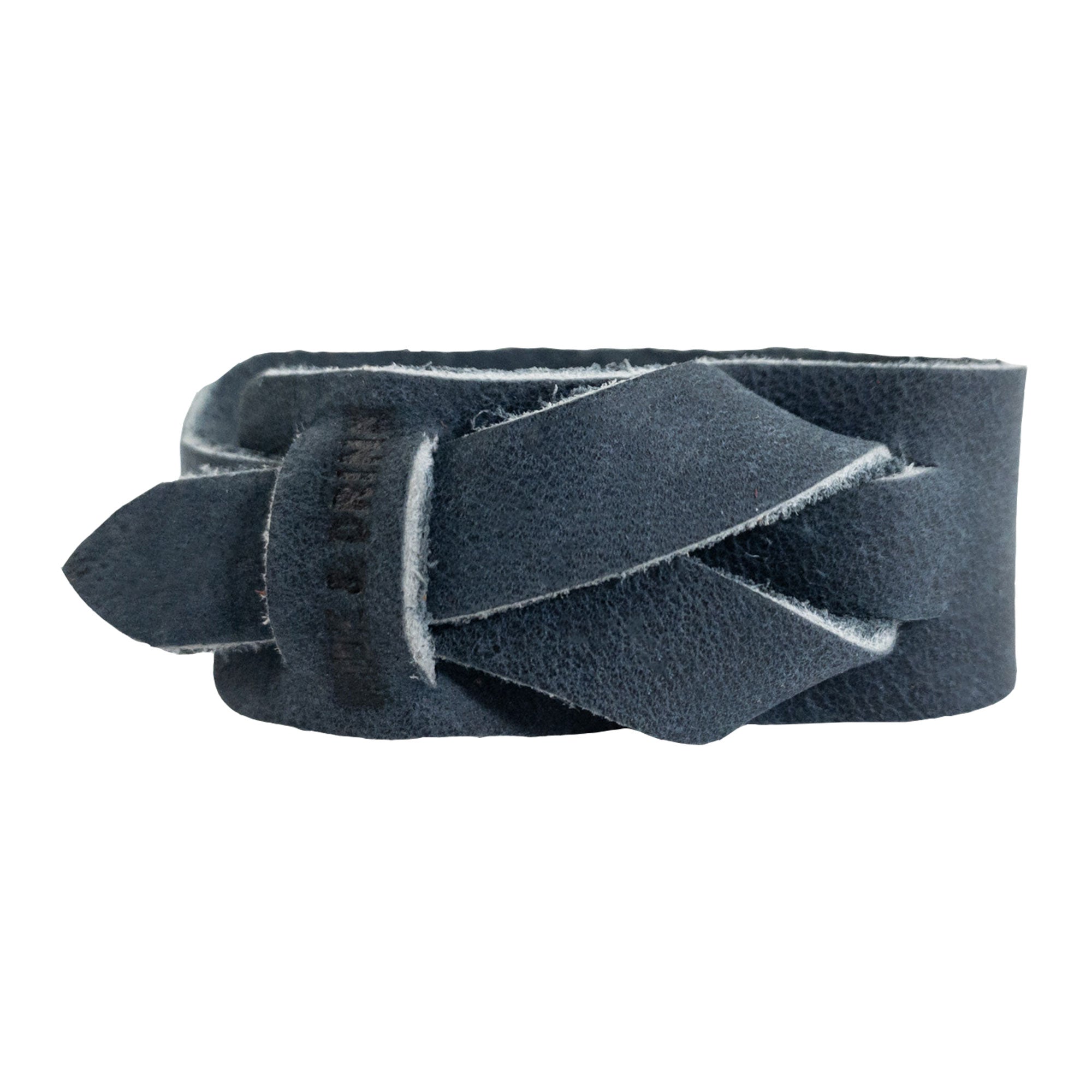 Hide & Drink's minimalistic wristband in navy blue full grain leather, emphasizing its subtle elegance and handmade craftsmanship. This adjustable cuff is a stylish bracelet from StockyardX, embodying artisan quality and rustic appeal.