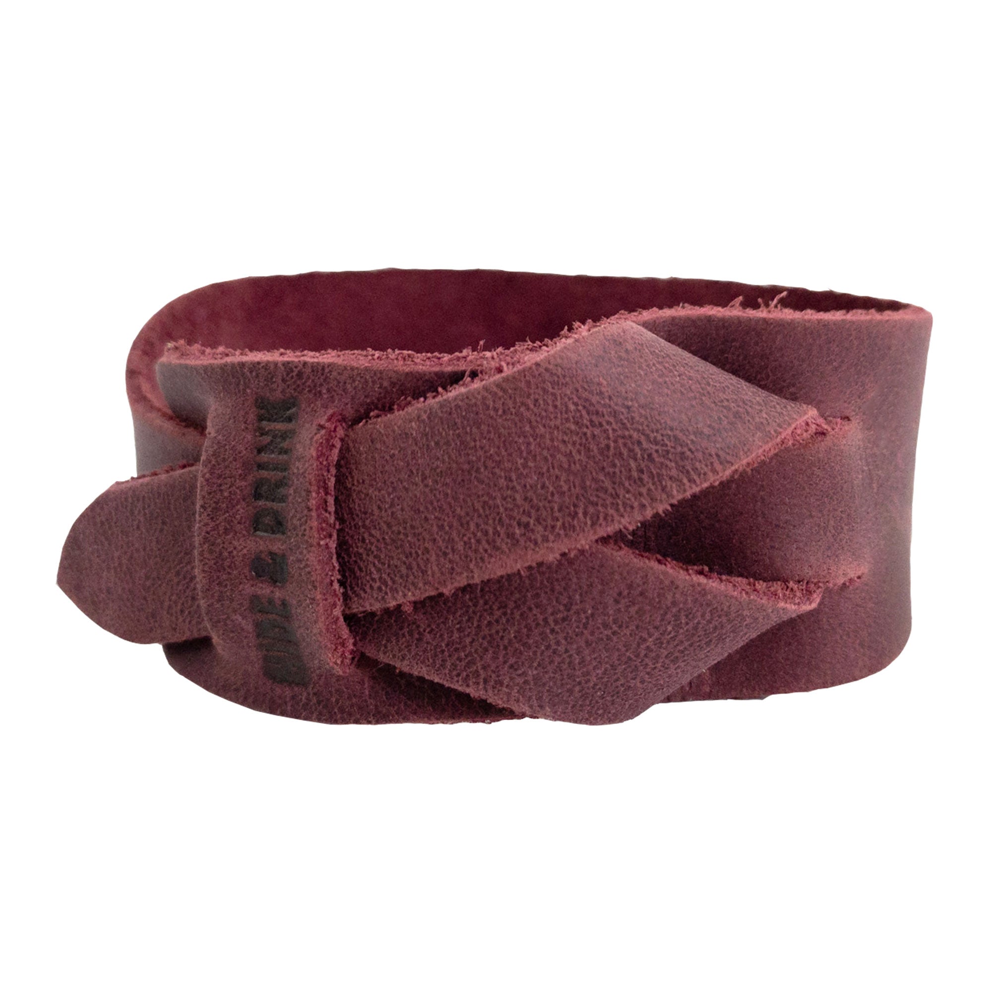 Hide & Drink's Minimalist Wristband in deep red full grain leather, highlighting its vibrant color and rustic design. This adjustable strap cuff showcases artisan craftsmanship that is handmade in La Antigua Guatemala by StockyardX.