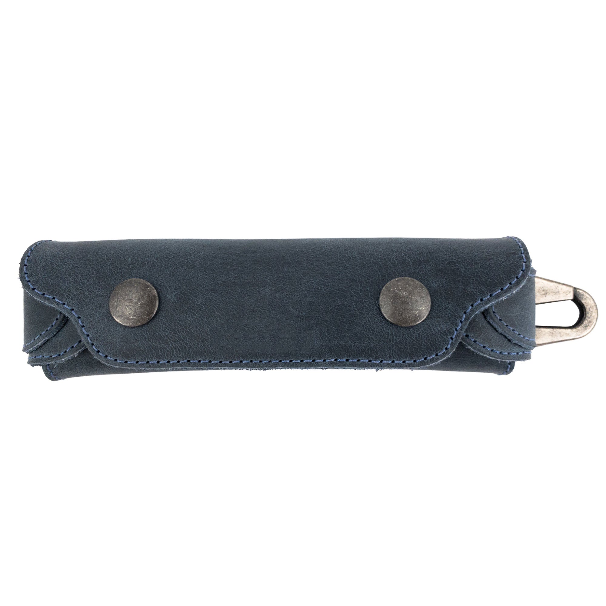 Dark blue Harmonica Case by Hide & Drink, displaying its stylish and functional design. Made from full grain leather, this musician accessory offers unique protection for harmonicas, embodying artisan craftsmanship from La Antigua Guatemala.